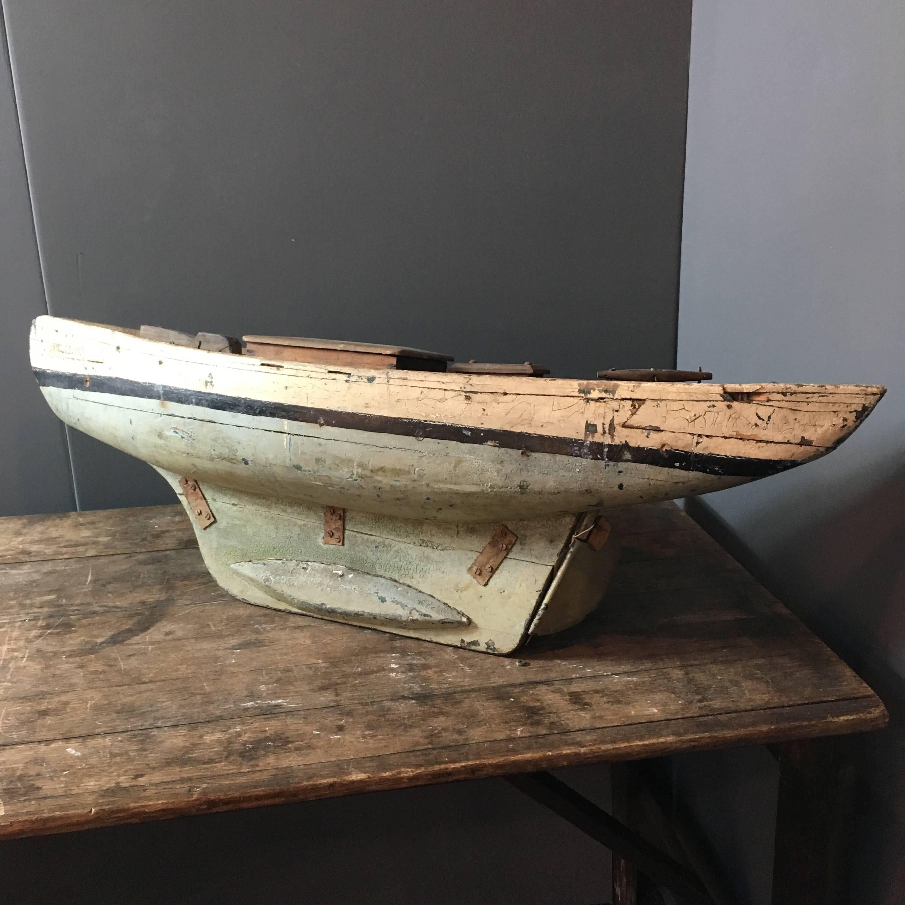 Stunning vintage French pond yacht

This is a handcrafted original sailing pond yacht

Measure: 96cm length

26cm width

30cm height

The patina on this is beautiful, in a soft blue and cream colour with black stripe

The boat is