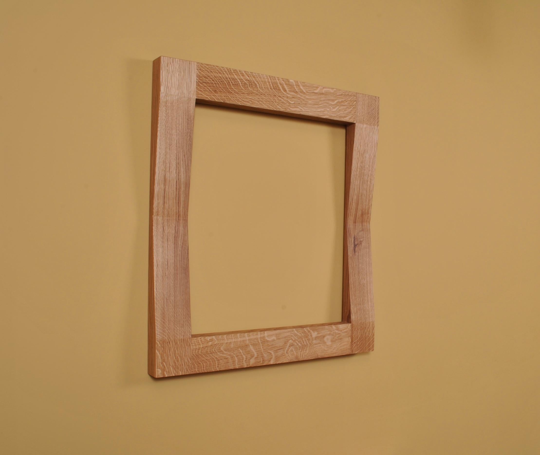 Large handcrafted ‘furrow’ oak framed mirror. Designed by SUM furniture and handcrafted in finest fully quartersawn English oak. Hand finished in natural oils. The furrow mirror creates a striking presence and gives the illusion of it having once