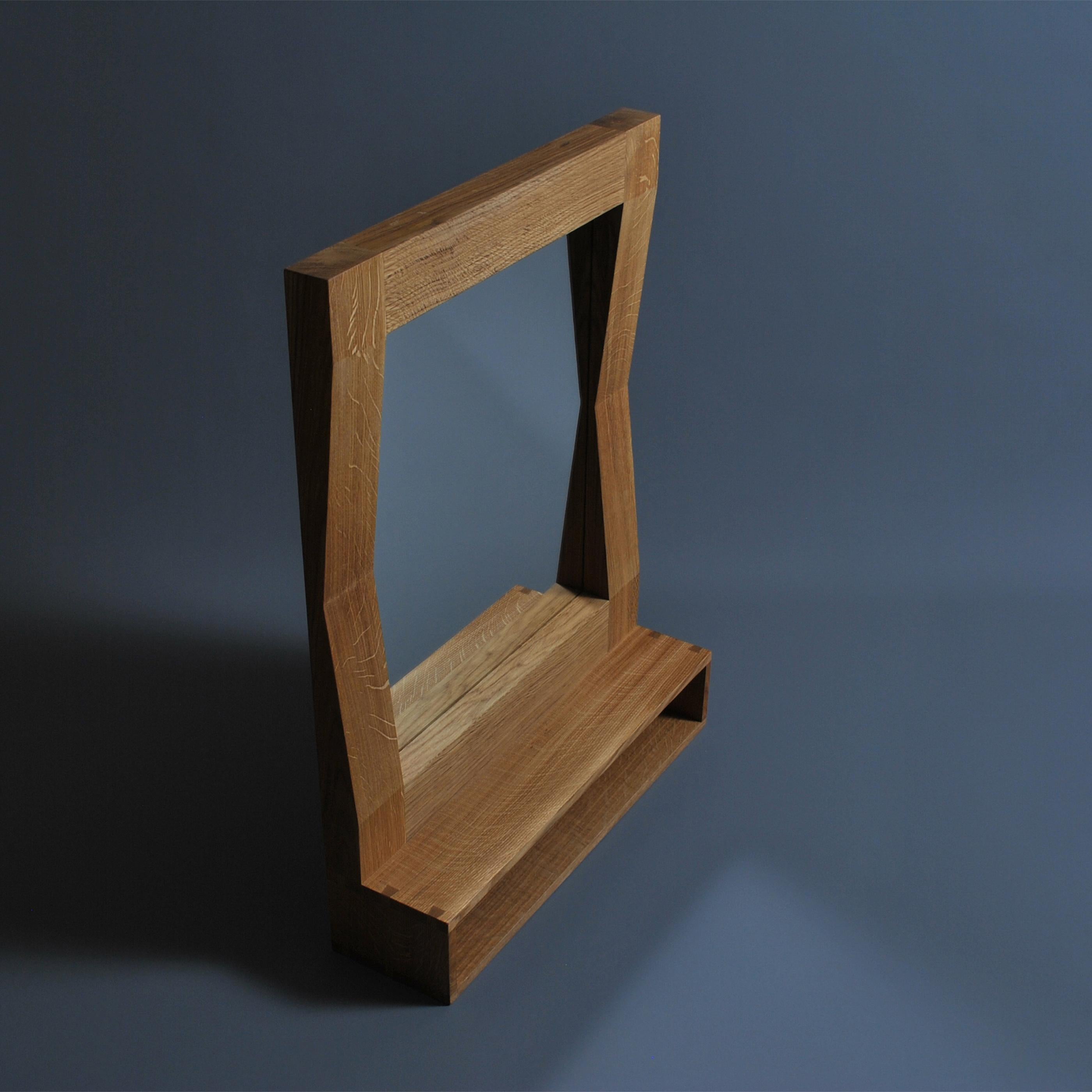 Large handcrafted ‘furrow’ oak framed mirror with shelf. Designed by SUM furniture and handcrafted using traditional techniques in finest fully quarter sawn English oak. Hand finished in natural oils. The furrow mirror holds a striking presence and
