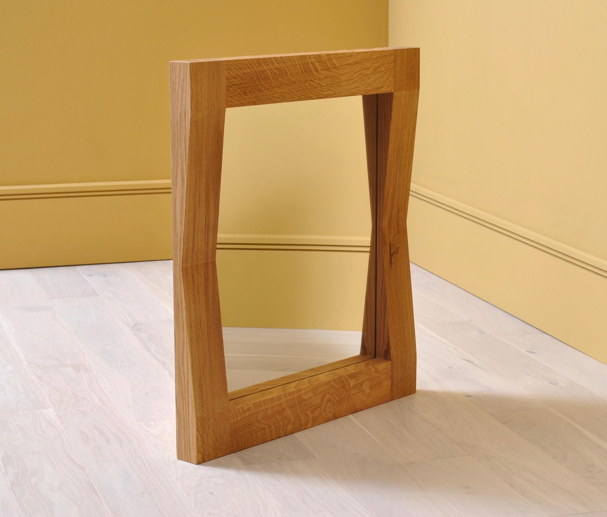 Large handcrafted ‘furrow’ oak framed mirror. Designed by SUM furniture and handcrafted using traditional techniques in finest fully quartersawn English oak. Hand finished in natural oils. The furrow mirror has a striking presence and gives the
