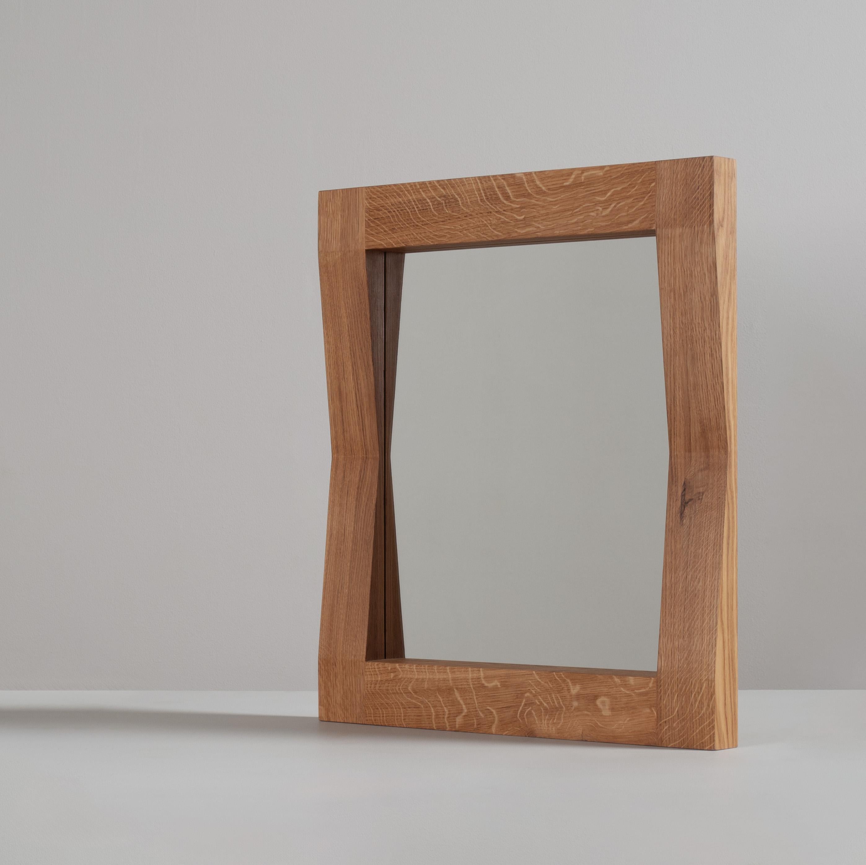 Large handcrafted ‘furrow’ English oak framed mirror. Designed and handcrafted using traditional cabinetry techniques in finest quartersawn English oak. Hand finished in durable natural oils. Keyhole hangers fitted to the back for safe and easy