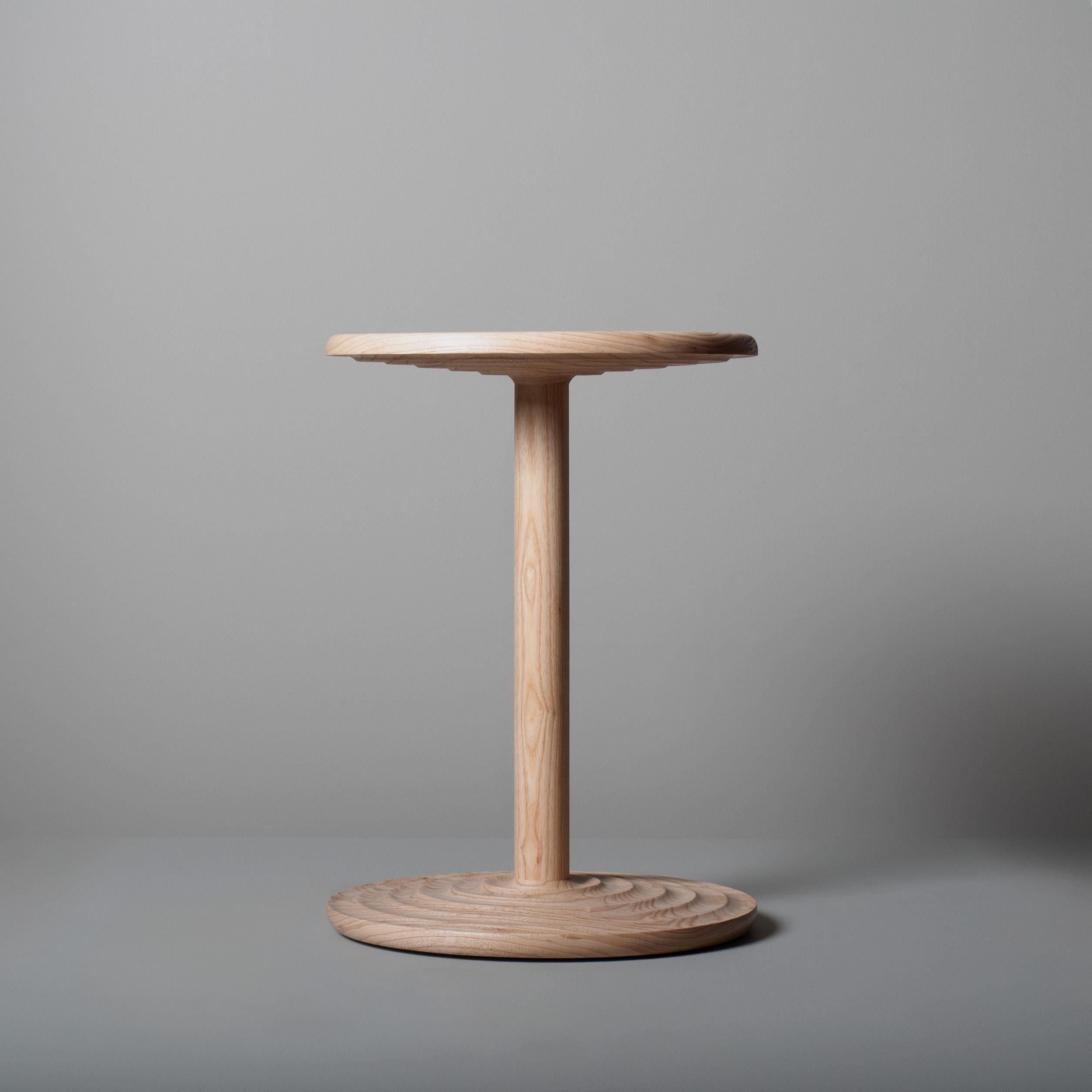 Beautifully hand-turned and handcrafted large version of our white ash rippled side table. Wonderful form and scale. This is a bespoke piece of fine quality, handmade in London by our craftsman using solid English ash timber. 
Other timbers are
