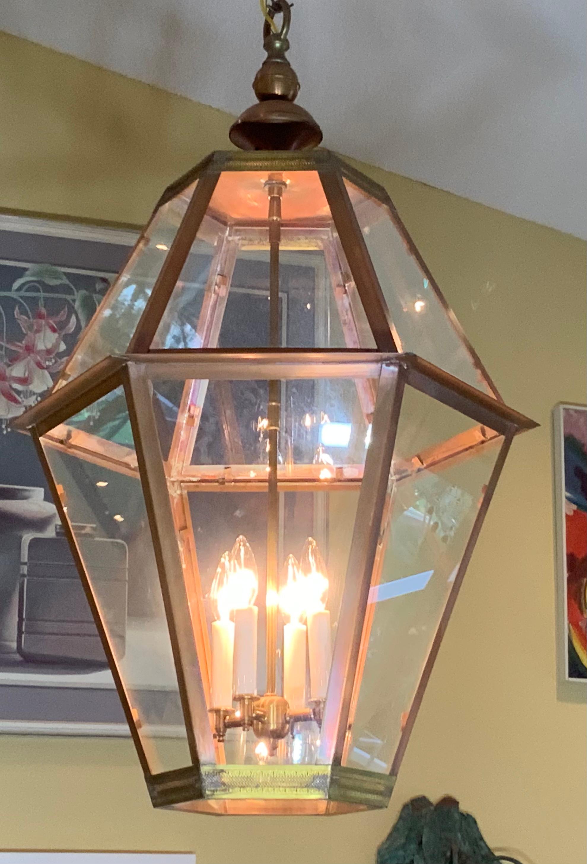 Exceptional six side custom made hanging lantern made of handcrafted solid copper and brass stem with four 60/watt lights, suitable for wet location
Up to US code, UL approved, great look indoor outdoor. Copper canopy and chain included. Measures: