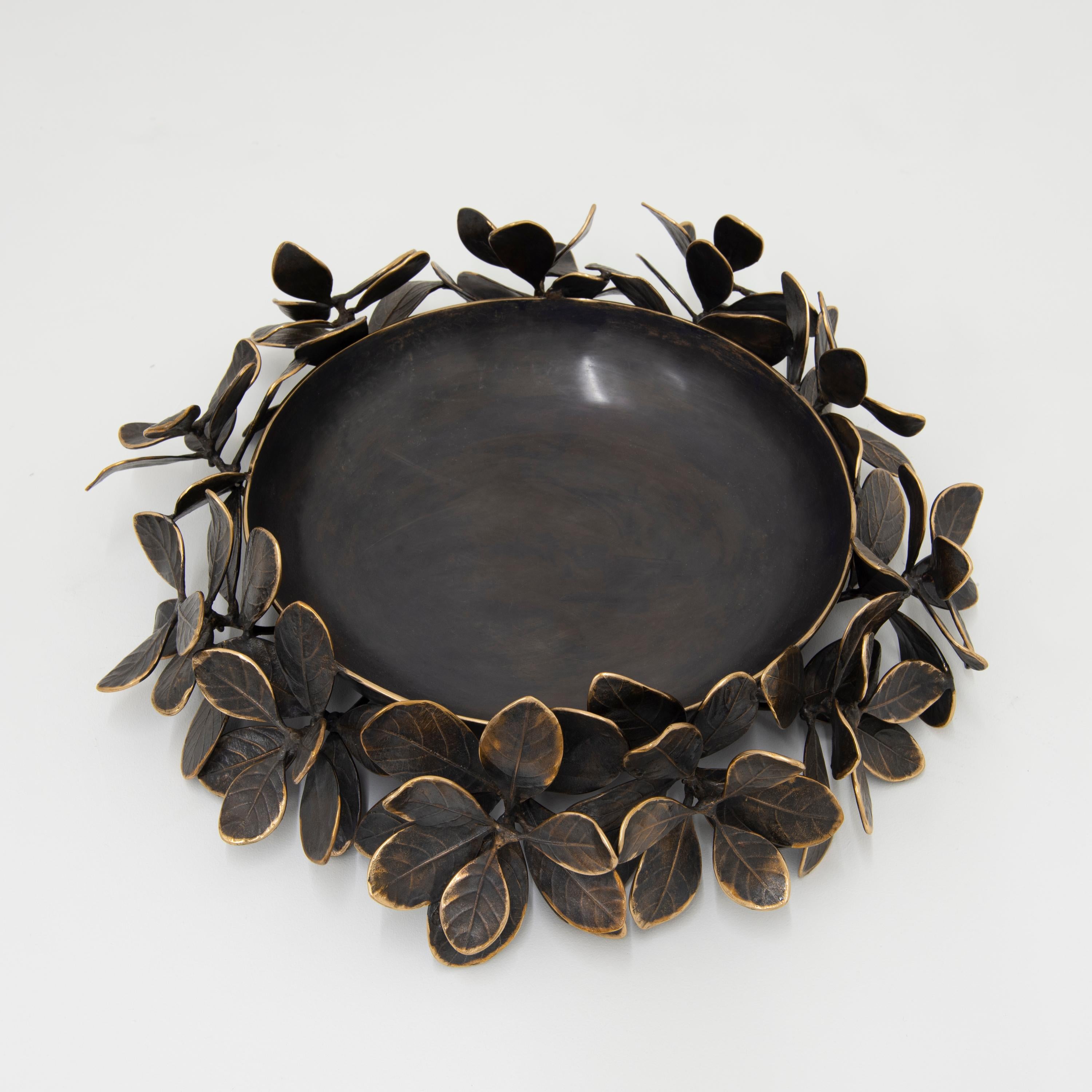 Unique and exquisite bronze cast leaf bowl. Handmade using highly skilled and specialised traditional processes to create an original and sumptuous piece.

Slight variations in the patina and polished finishes, patterns and sizes are characteristics