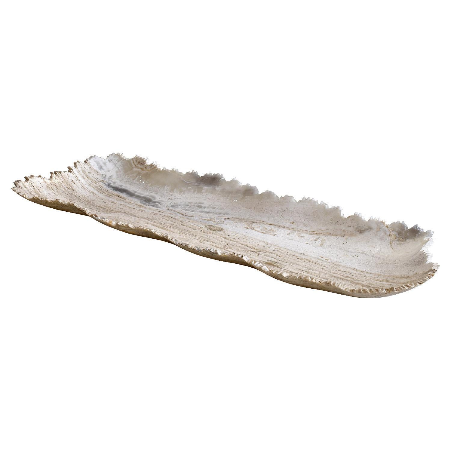 Handmade in Mexico
Carved from a single piece of onyx
One of a kind
Dimensions: 33 x 12 x 2 in. / 84 x 30 x 5 cm

A slim, long, low, organic platter from naturally colored stone with the mineral formations within the rock similar to looking at