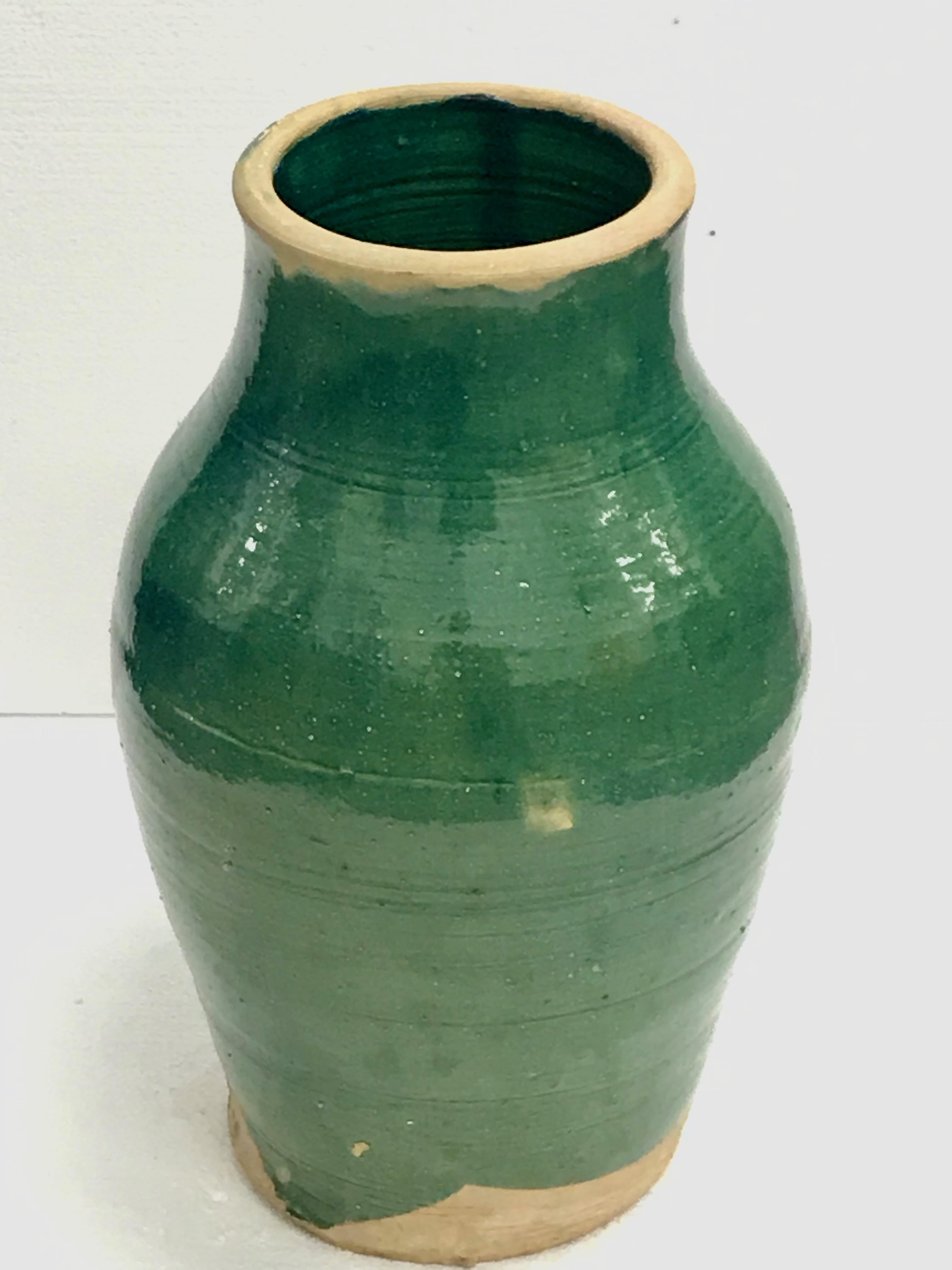 Large handmade terracotta pot / urn. 
Each piece is unique, created by using traditional ancient technique, organic materials and pigments. 
Inside of this pot is glazed as well as its outside.
Measures: Height 53.5 cm
Top diameter from outside edge