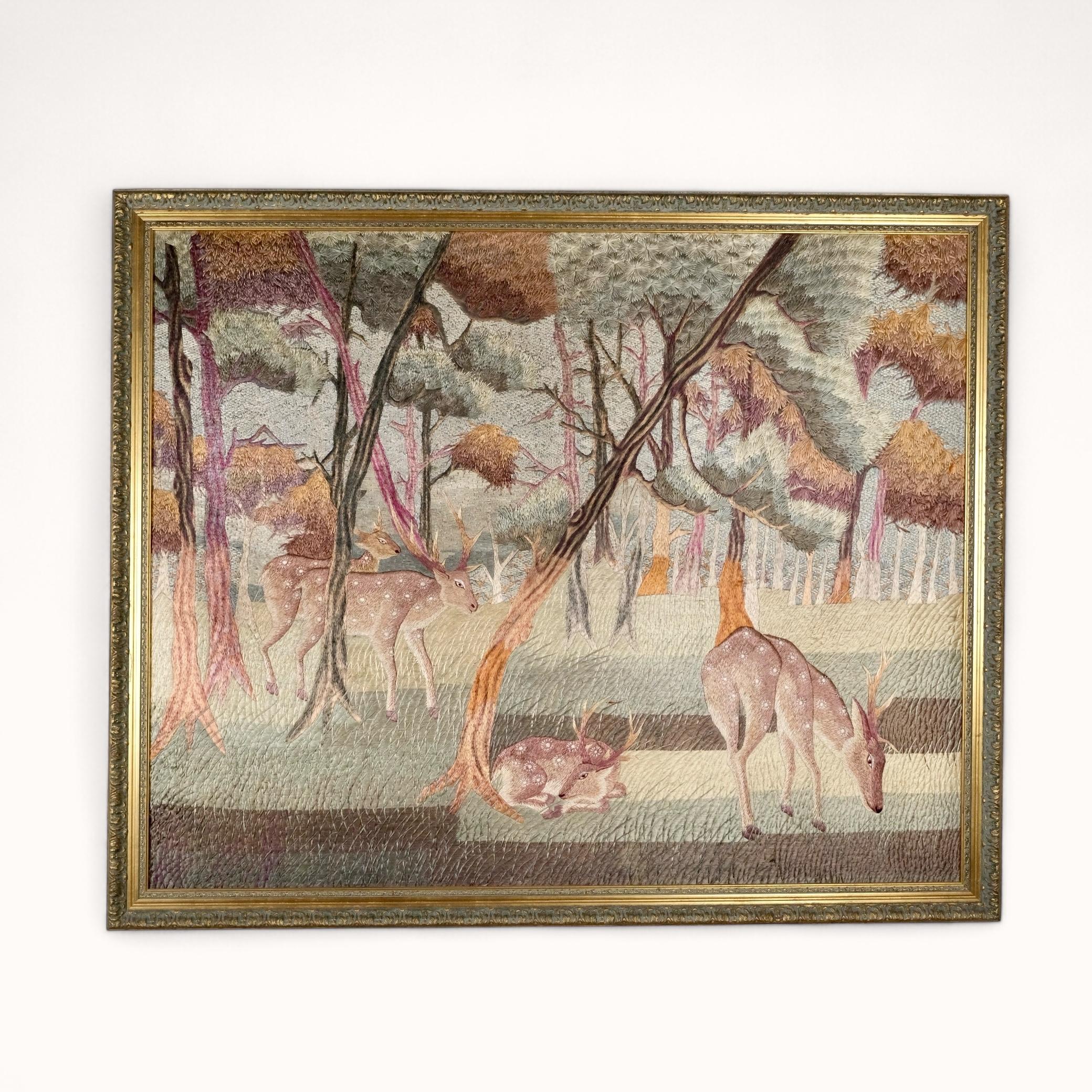 Beautiful tapestry-like silk embroidery, handmade around 1940-1950s.
Depicting a gorgeous and peaceful Verdure scenery, with trees and deers, a beautiful color palette and lots of details.
As it's made of silk, colors shades are changing depending