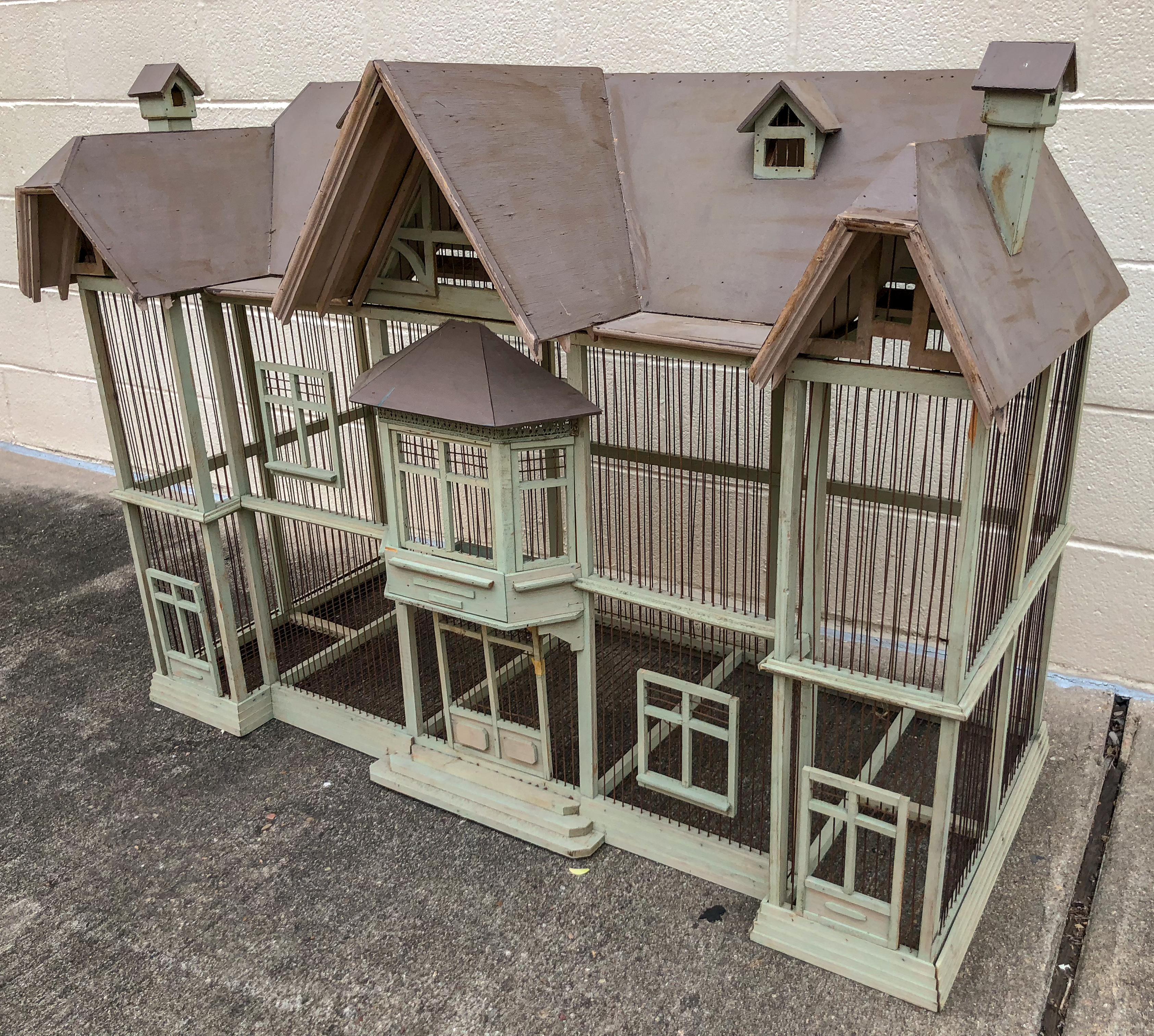 While in Northern France recently curating for our container, we came across a dealer with a most interesting story, indeed.  While purchasing a very large armoire, we noticed across the hall, a large scale but quite interesting birdcage that had a
