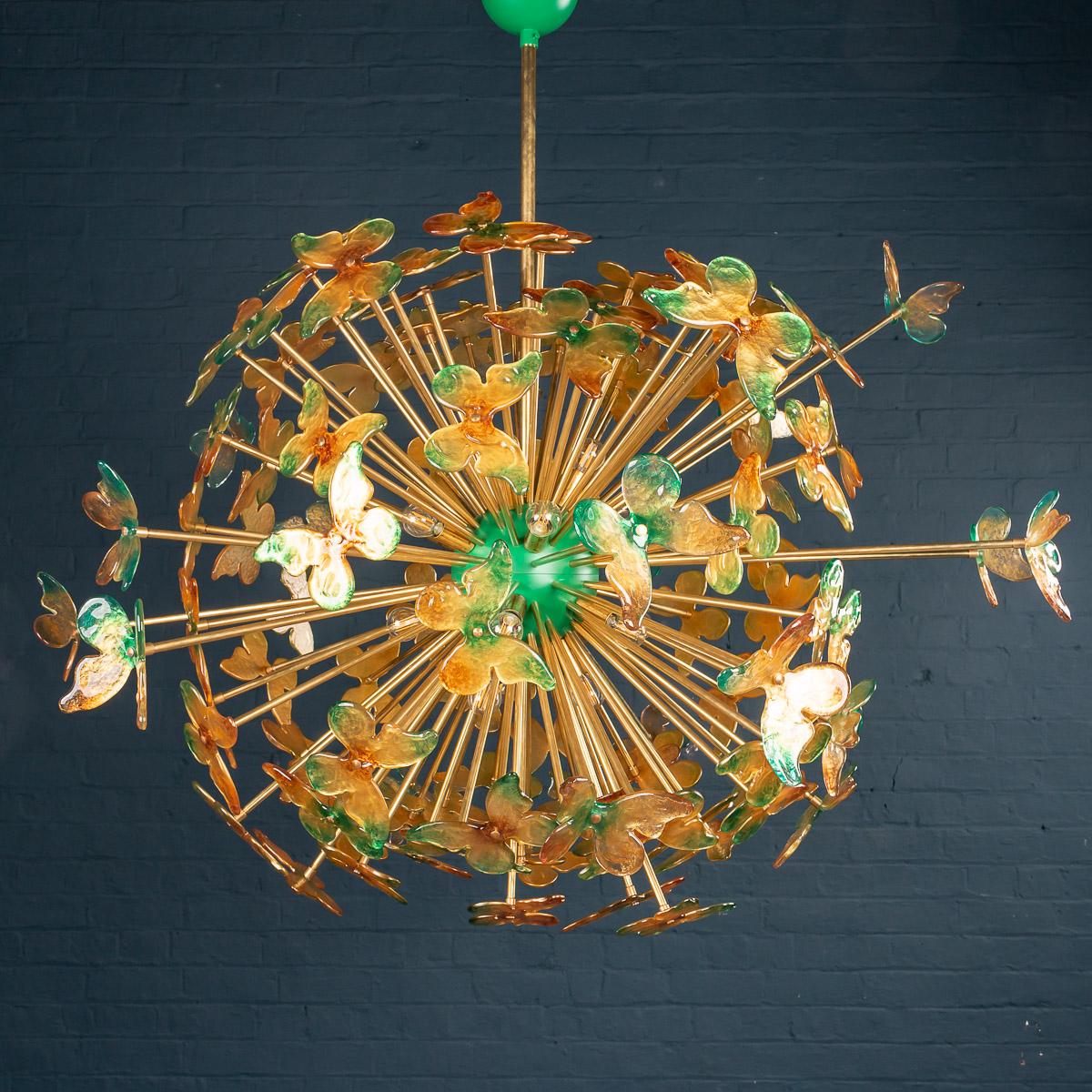 Very large Venetian handmade chandelier, inspired by 1950s “Sputnik“ models, made with glass green and gold butterflies exploding from the centre. A truly spectacular piece of interior design, made in a very limited number in Venice,
