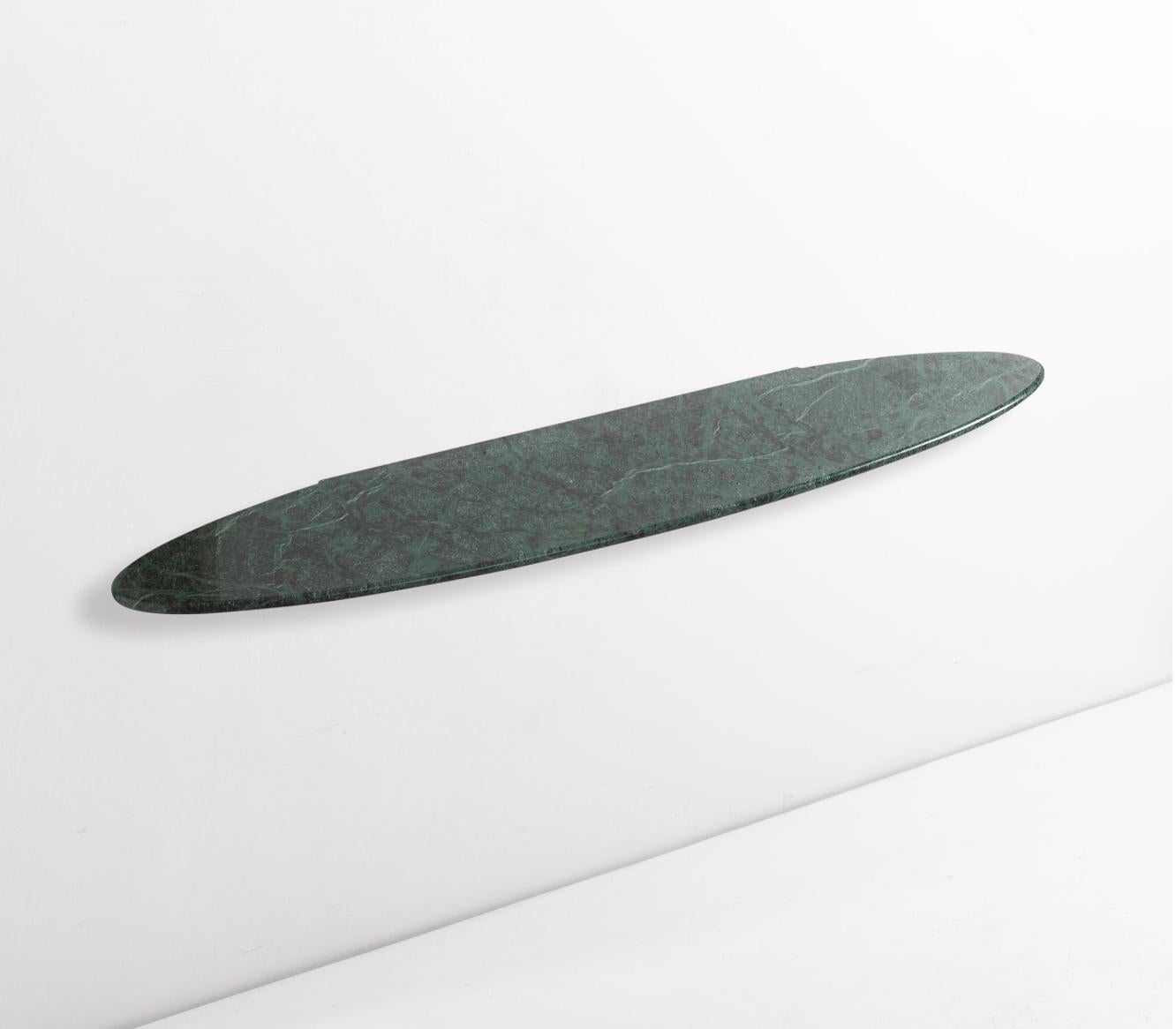 Large hanging console in green Alpi marble, Italy

A highly refined console, in authentic green Alpine marble, with brass supports that can be easily attached to the wall. The 3 cm thickness is notable and gives importance to the console, essential