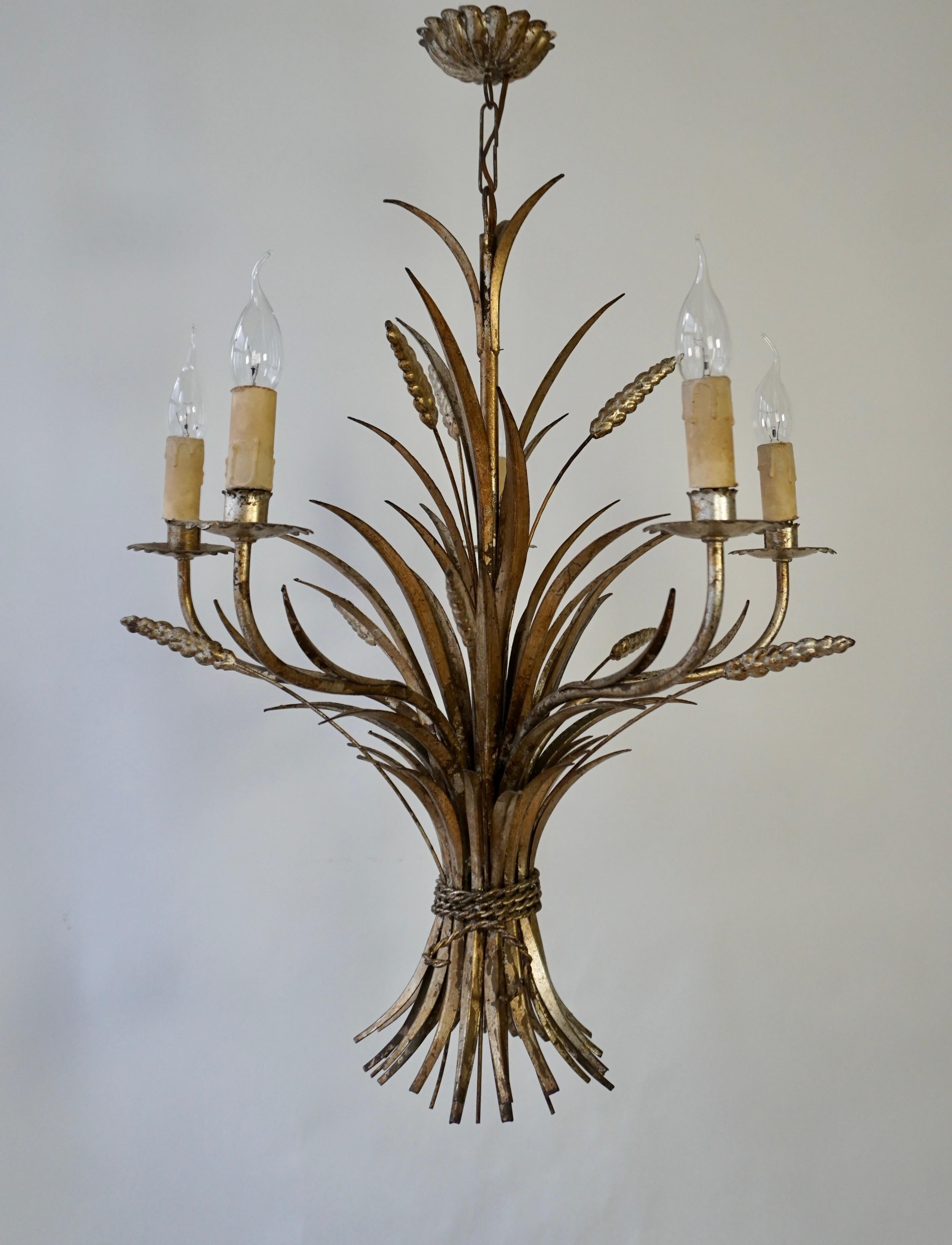 Large hanging lamp design by Hans Kogl, 1970 Italy.   

Hollywood Regency style hanging lamp with ears of corn and floral details. This beautiful lamp comes from the 1960s and was designed by Hans Kögl.  

A large Hollywood Regency eight-armed lamp