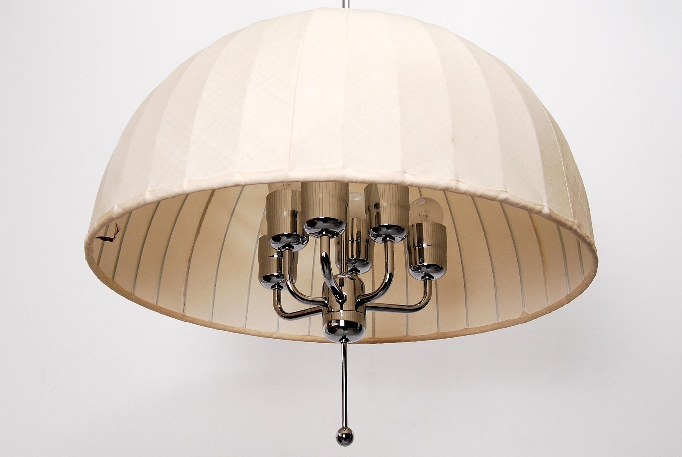 Large ceiling pendant with original shade in cream/ivory white silk fabric on white lacquered metal mount. Rare larger model Carolin T549/6 in nickel plated brass designed 1963 by Hans-Agne Jakobsson. Both lamp itself and the shade are height