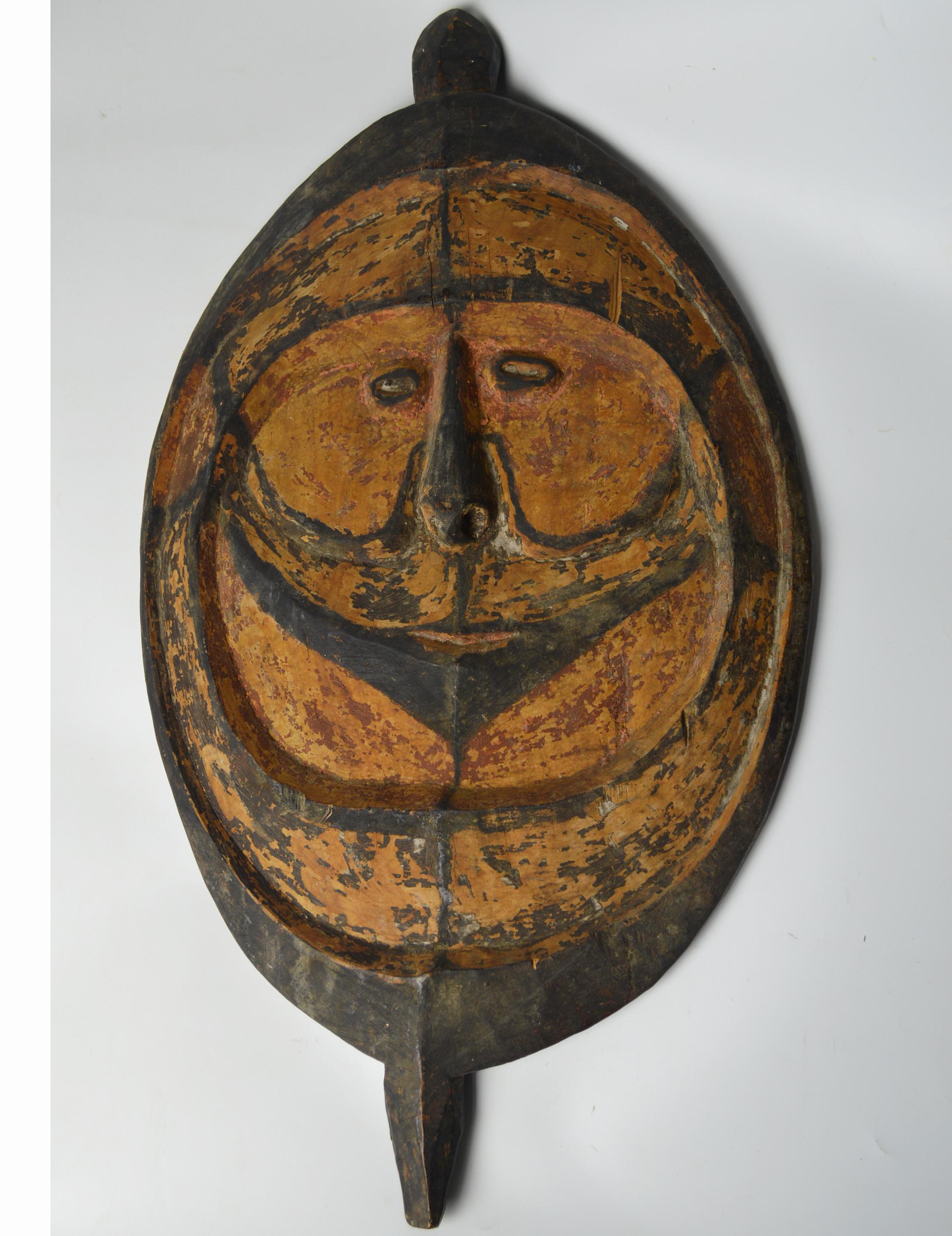 Large hard wood gable mask Ramu River Papua
Large disc shaped gable mask from the Ramu river Papua new Guinea
Carved hard heavy wood with applied pigments
Period early-mid 20th century
Ex Uk collection
Size 25 x 14 x 3 inches 64 x 36 cm.