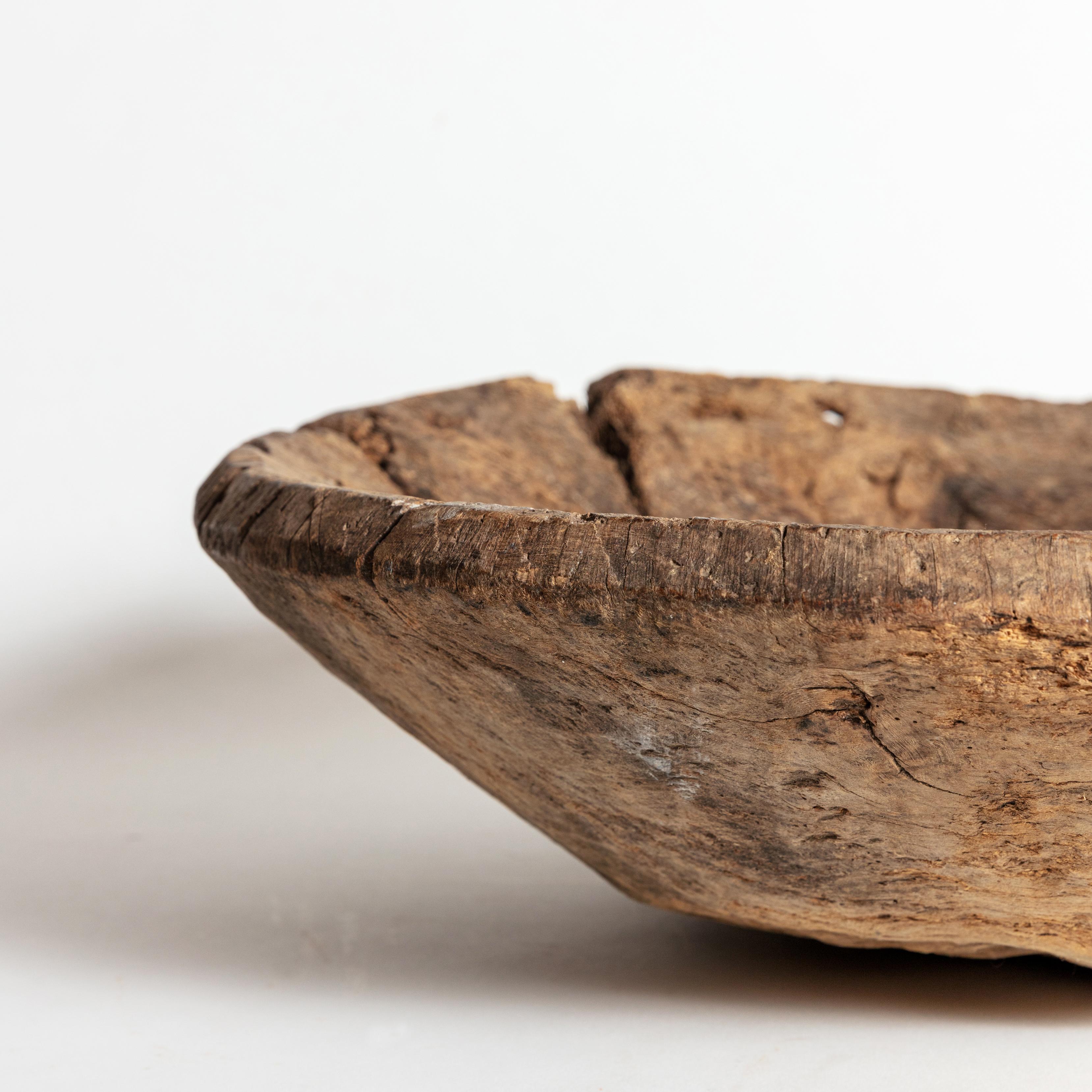 Large Hardwood Mortar Bowl with Metal Repairs, 19th Century In Distressed Condition For Sale In Brooklyn, NY