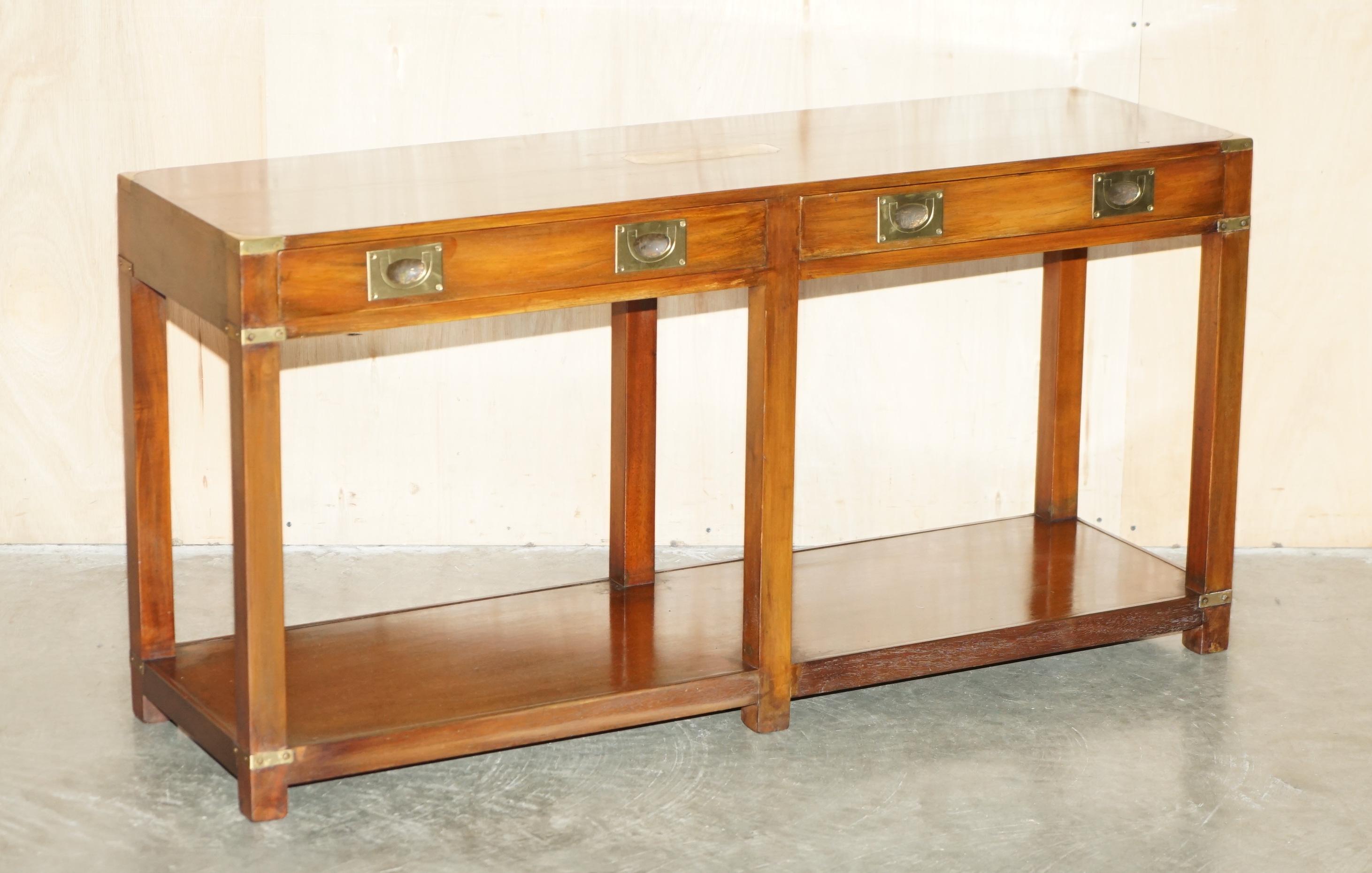 Royal House Antiques

Royal House Antiques is delighted to offer for sale this lovely Vintage Harrods London Retailed, REH Kennedy made Mahogany & Brass Military Campaign two drawer console table

Please note the delivery fee listed is just a guide,