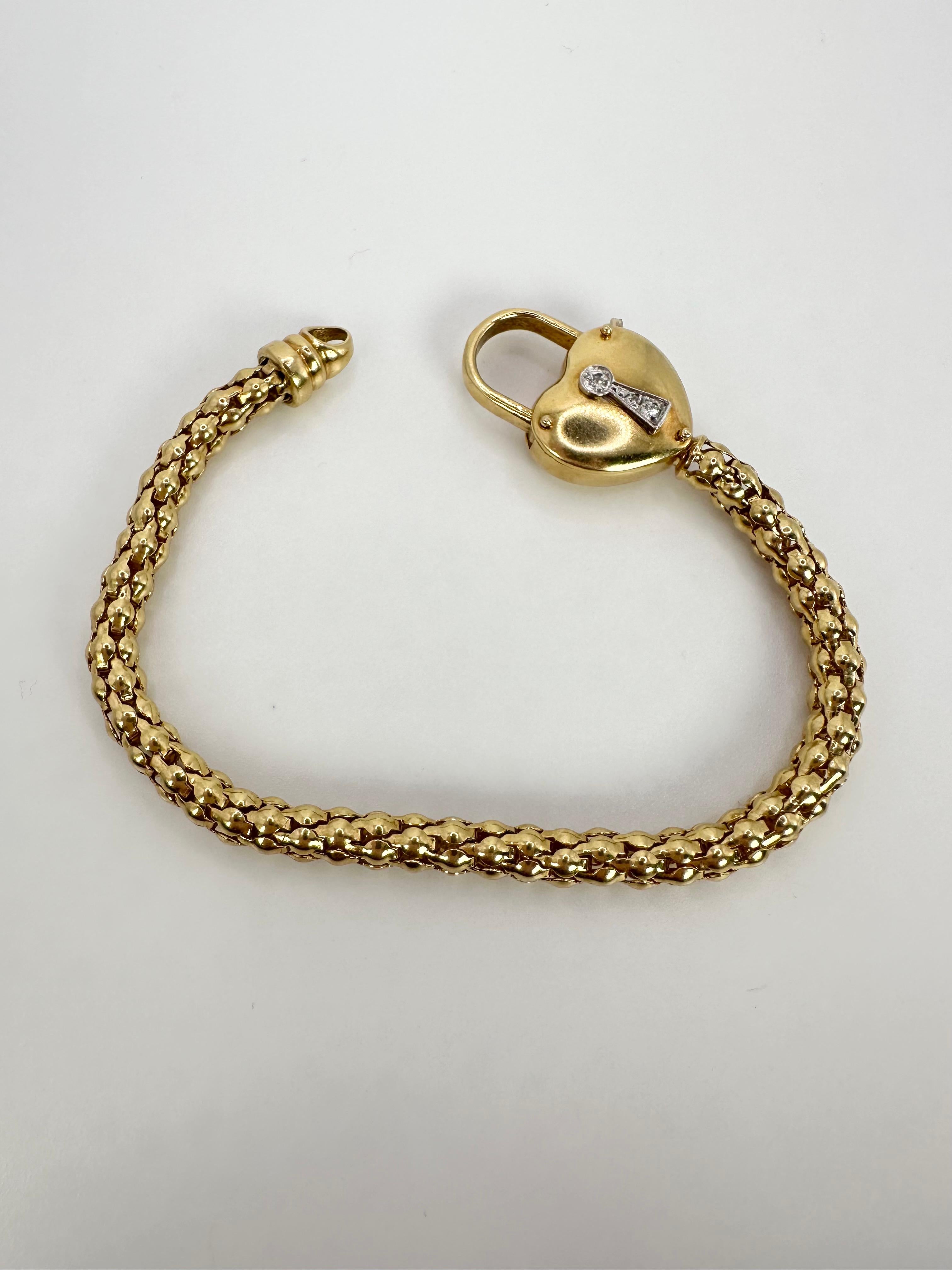 Estate Le Gi, stunning heart bracelet in 18kt yellow gold.
GRAM WEIGHT: 18.75
METAL: 14KT yellow gold

NATURAL DIAMOND(S)
Cut: Round Brilliant
Color: G-H 
Clarity: SI 
Carat: 0.35ct
Length: 7.75”
Item number: 440-00038 OKR


WHAT YOU GET AT STAMPAR