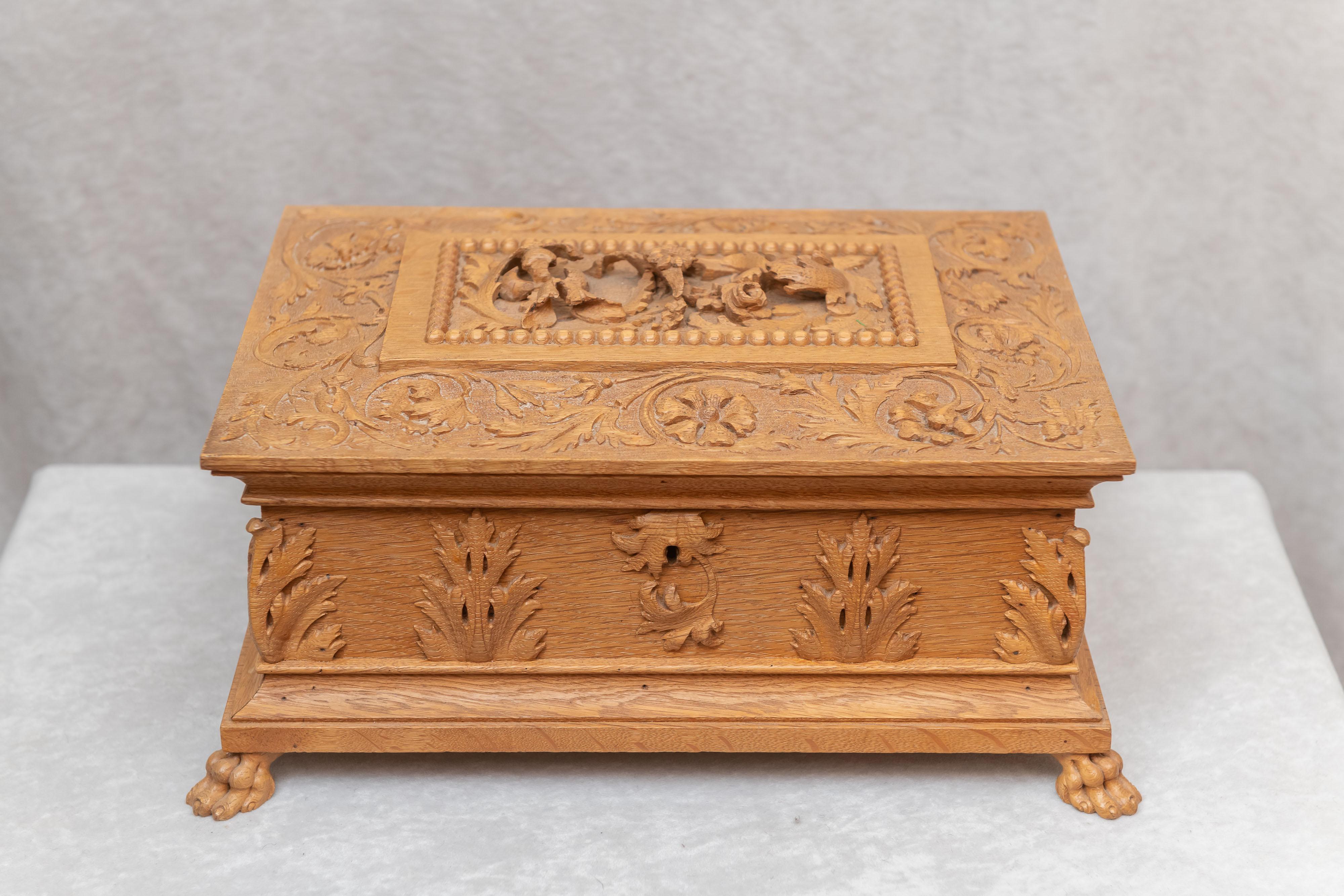 Calling this an oak box is like calling a Rolls Royce a car. I have sold and seen many oak boxes in my over 40 years, but none of this grand order. While it is heavily carved, it is done so well that it still maintains it's dignity. Carved by a