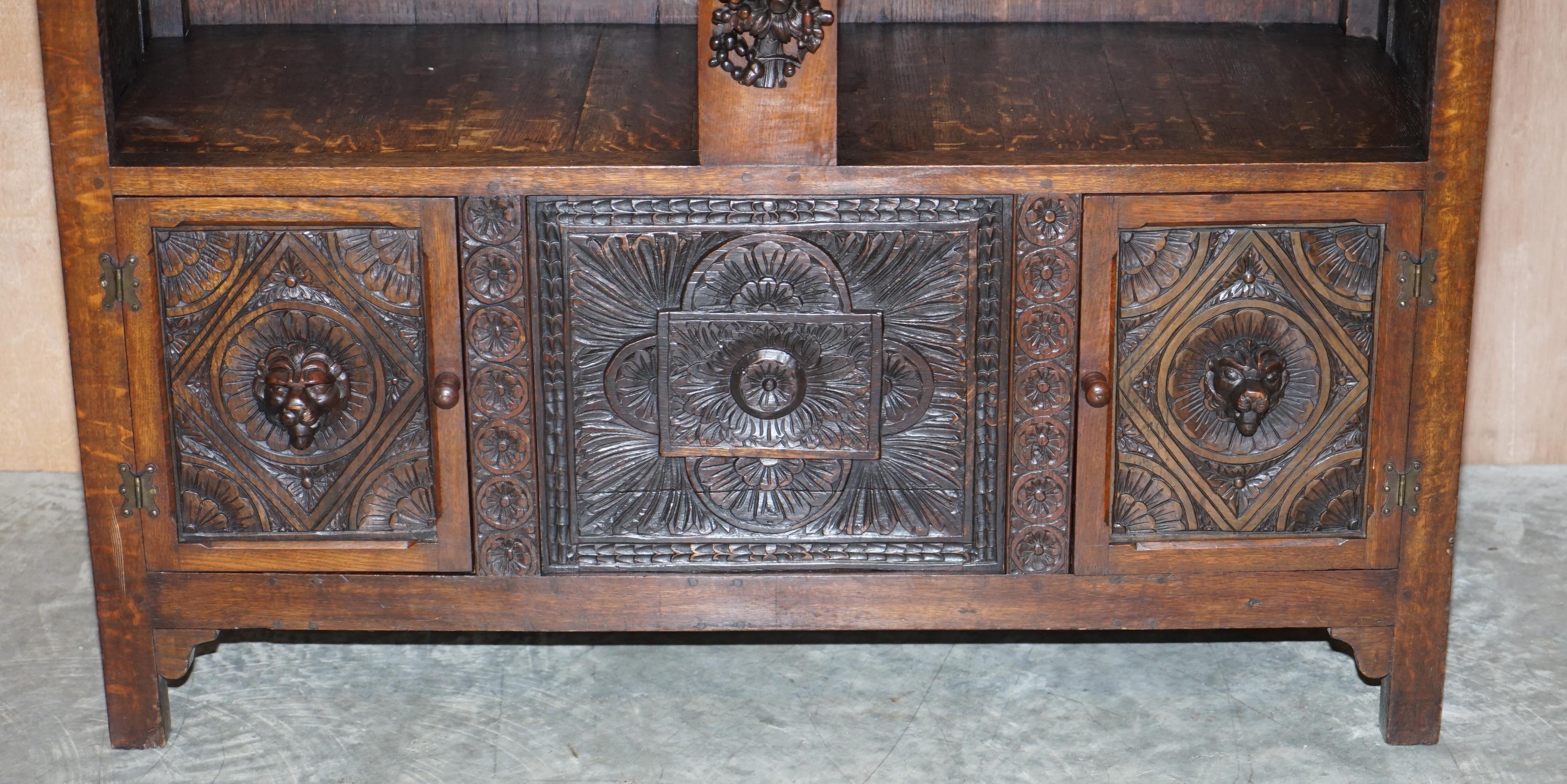 Large Heavily Carved Bookcase Cupboard with Ornate Cherub Putti & Lion Figures For Sale 4