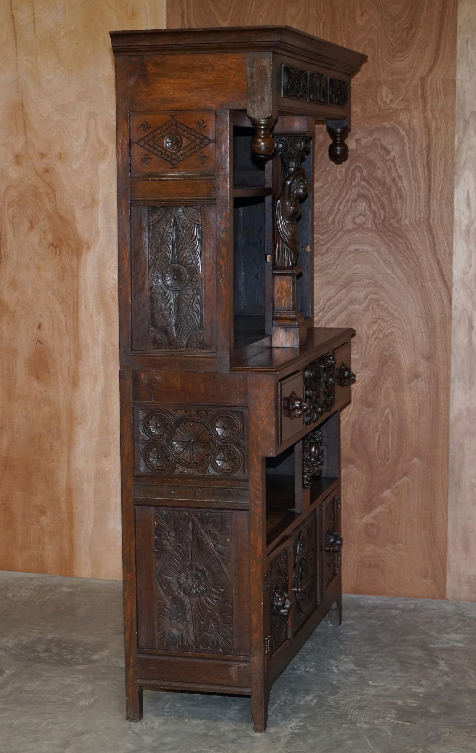 Large Heavily Carved Bookcase Cupboard with Ornate Cherub Putti & Lion Figures For Sale 5