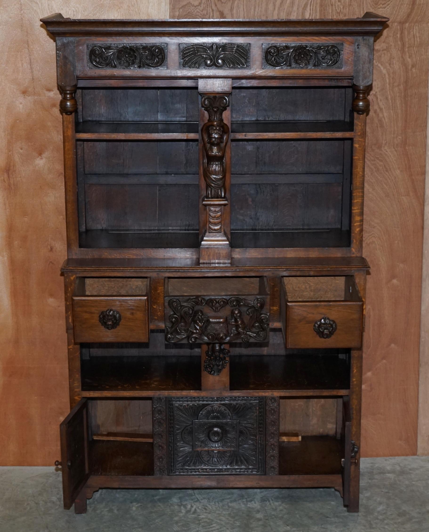 Large Heavily Carved Bookcase Cupboard with Ornate Cherub Putti & Lion Figures For Sale 8