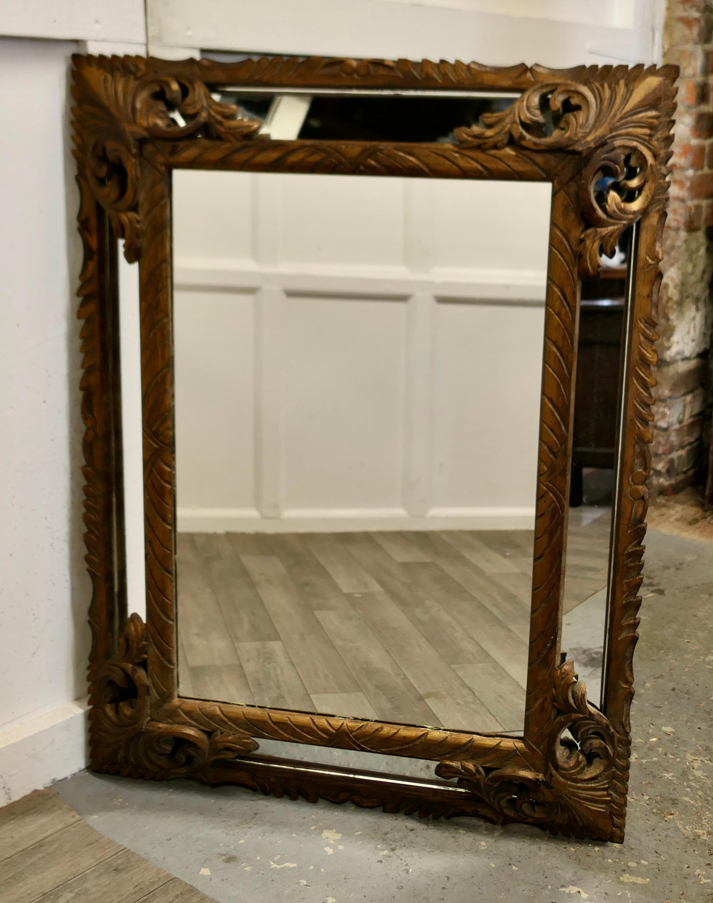 19th Century Large Heavily Carved French Oak Gilt Cushion Mirror For Sale