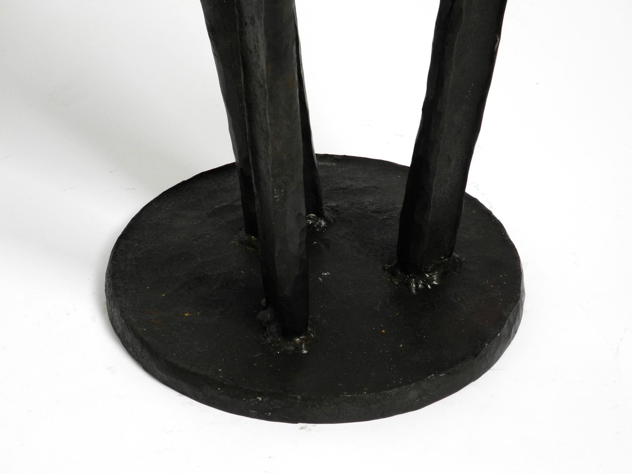 Large, heavy 50s floor candle holder made of wrought iron in Mid Century design For Sale 2