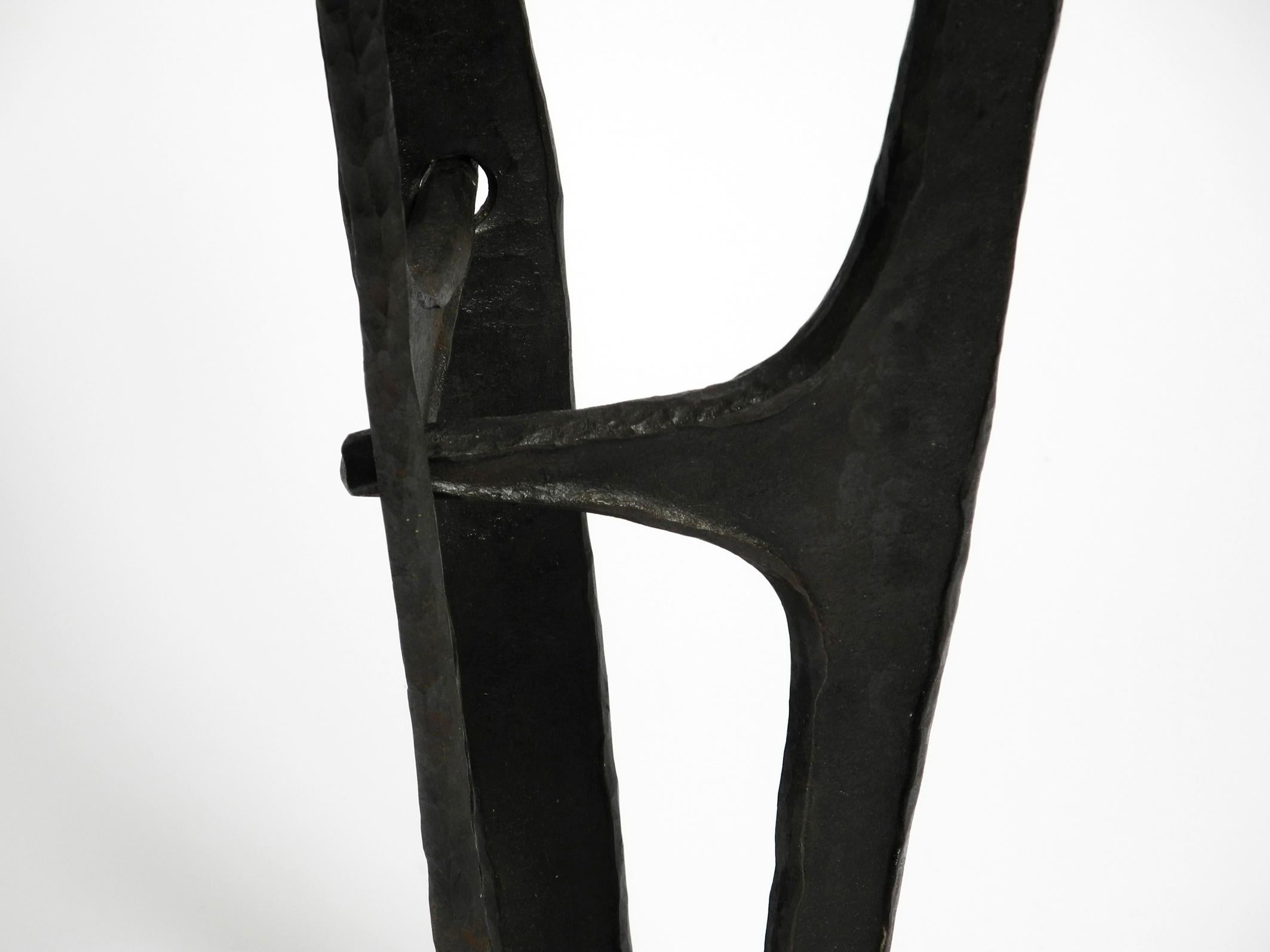 Large, heavy 50s floor candle holder made of wrought iron in Mid Century design For Sale 4