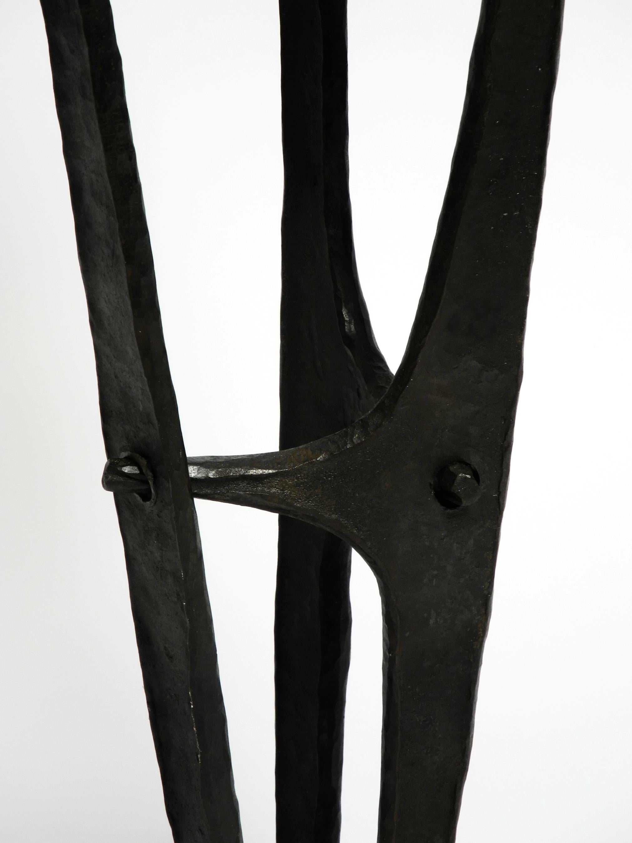 Large, heavy 50s floor candle holder made of wrought iron in Mid Century design For Sale 5