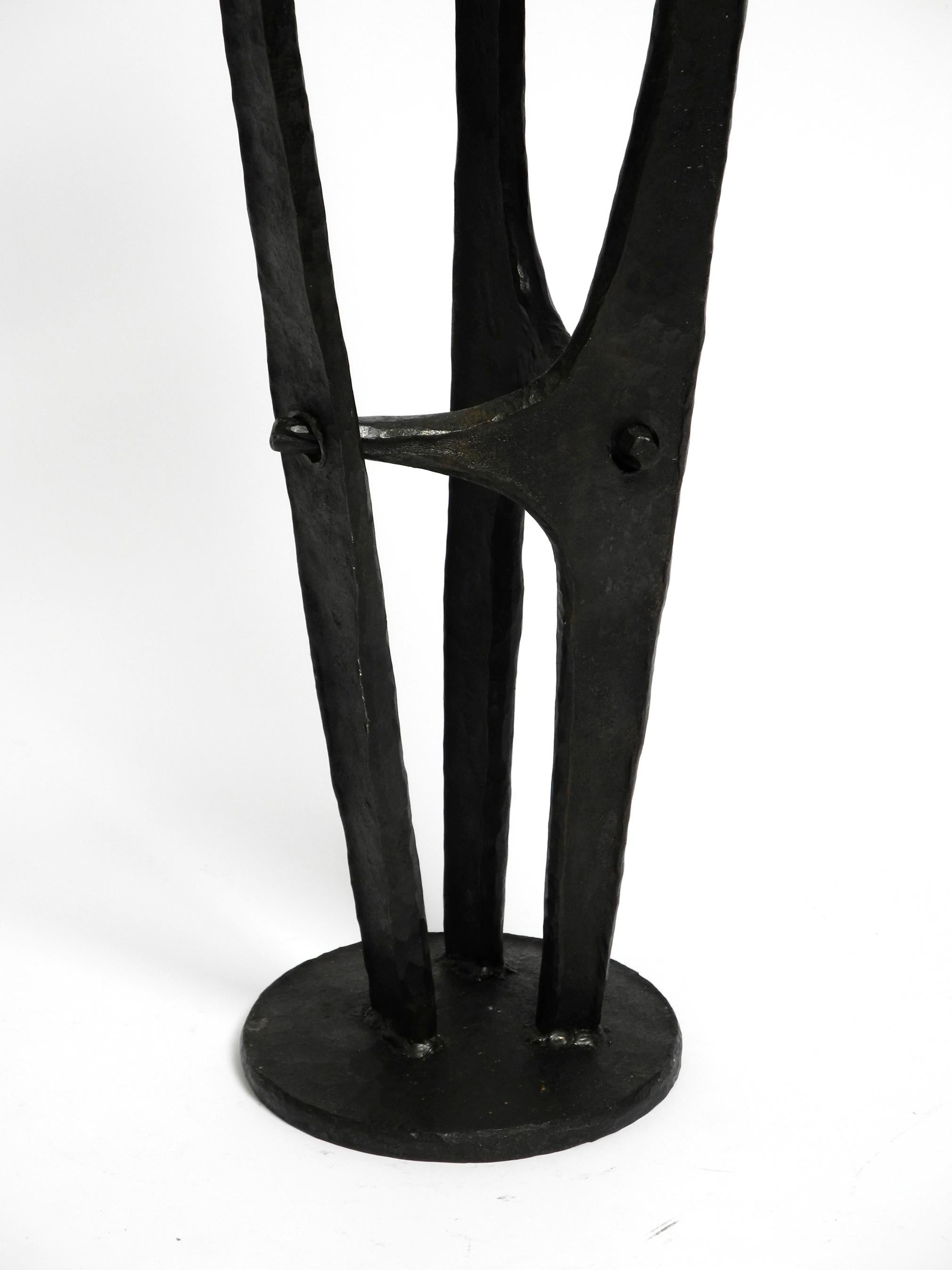 Large, heavy 50s floor candle holder made of wrought iron in Mid Century design For Sale 8