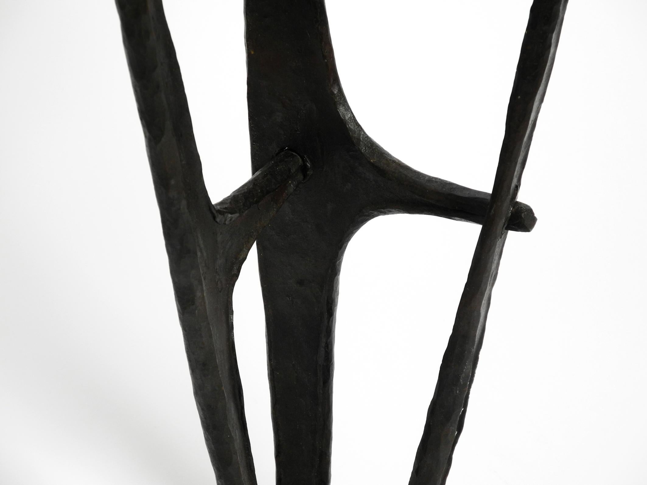Mid-20th Century Large, heavy 50s floor candle holder made of wrought iron in Mid Century design For Sale