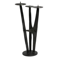 Large, heavy 50s floor candle holder made of wrought iron in Mid Century design
