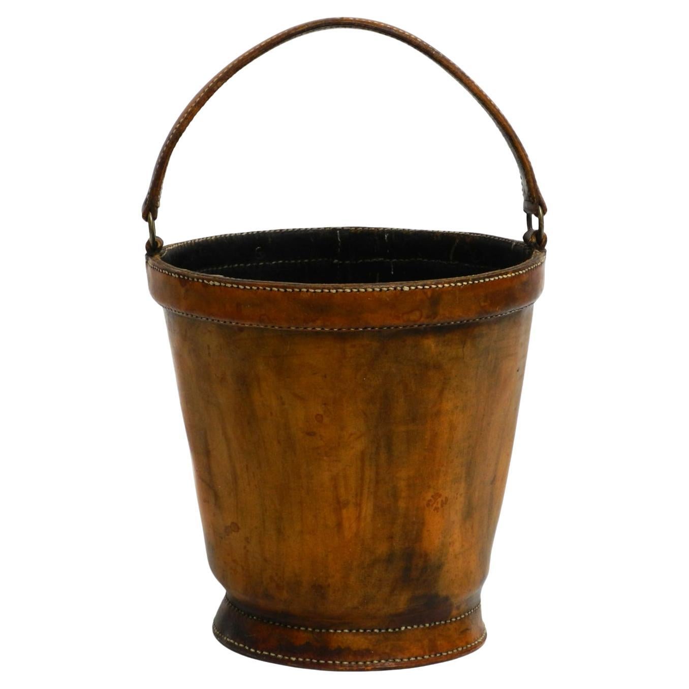 Large heavy Mid Century Modern paper basket made of sturdy thick cowhide