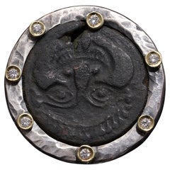 Grande anello d'argento pesante con moneta antica