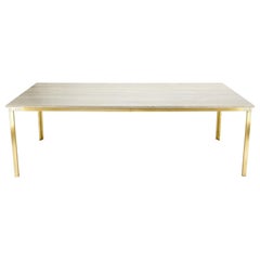 Mesa de comedor rectangular grande con base de latón macizo y tapa de travertino