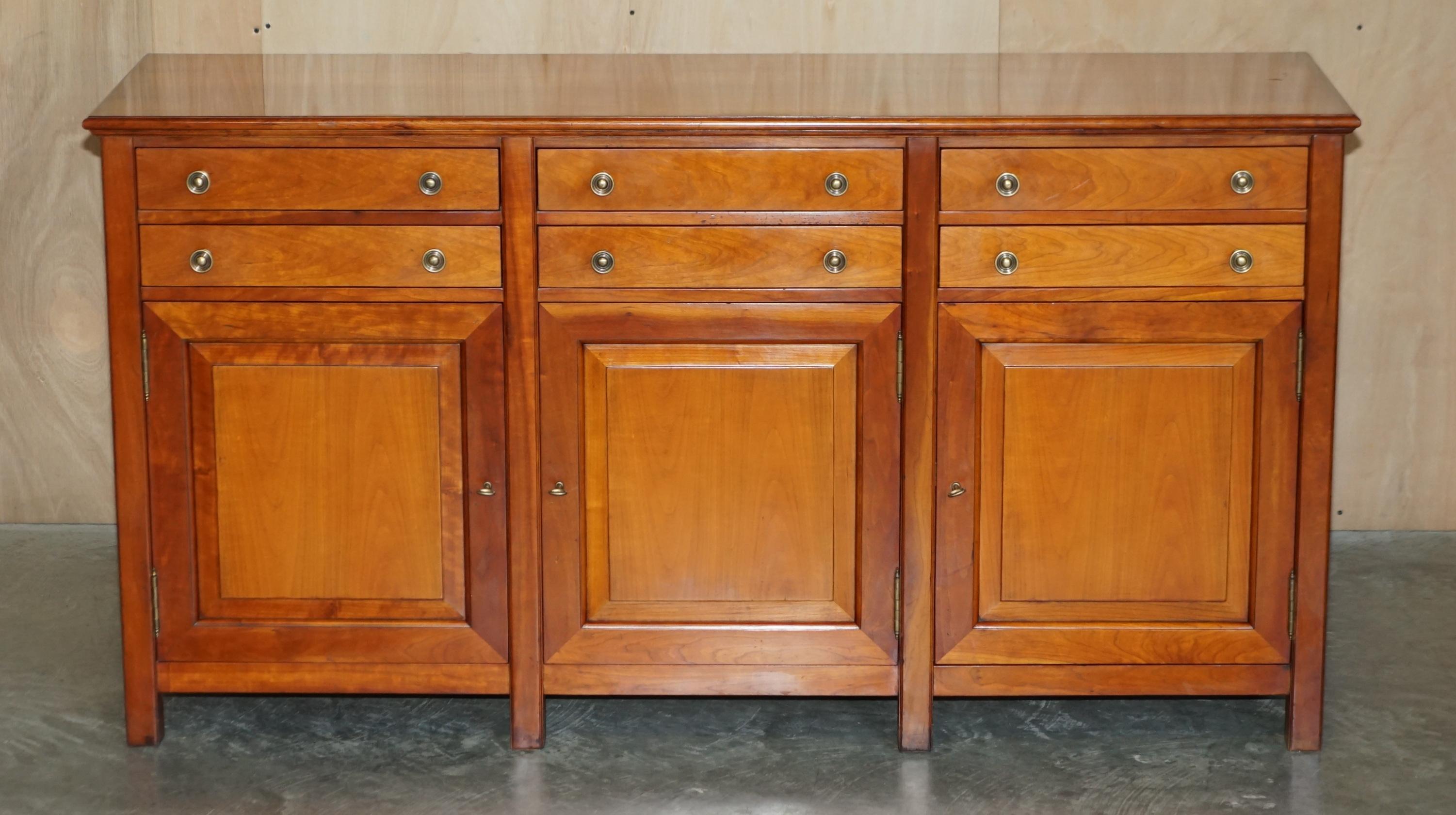 We ar delighted to offer for sale this stunning, hand made in England from solid Cherrywood, Multiyork sideboard with six drawers.

A very good looking well made and solid piece of furniture, this piece has a wonderful cherry patina and looks