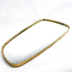 Large heavy vintage wall mirror, kidney-shaped, 1950s