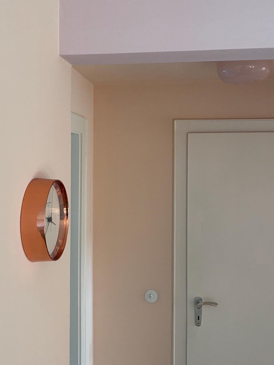 Rare copper clock Design by Henning Koppel for Goerg Jensen. This copper edition version of this clock has been out of production for decades.
No parts missing, no damages and full working condition.
We offer free shipping.


 