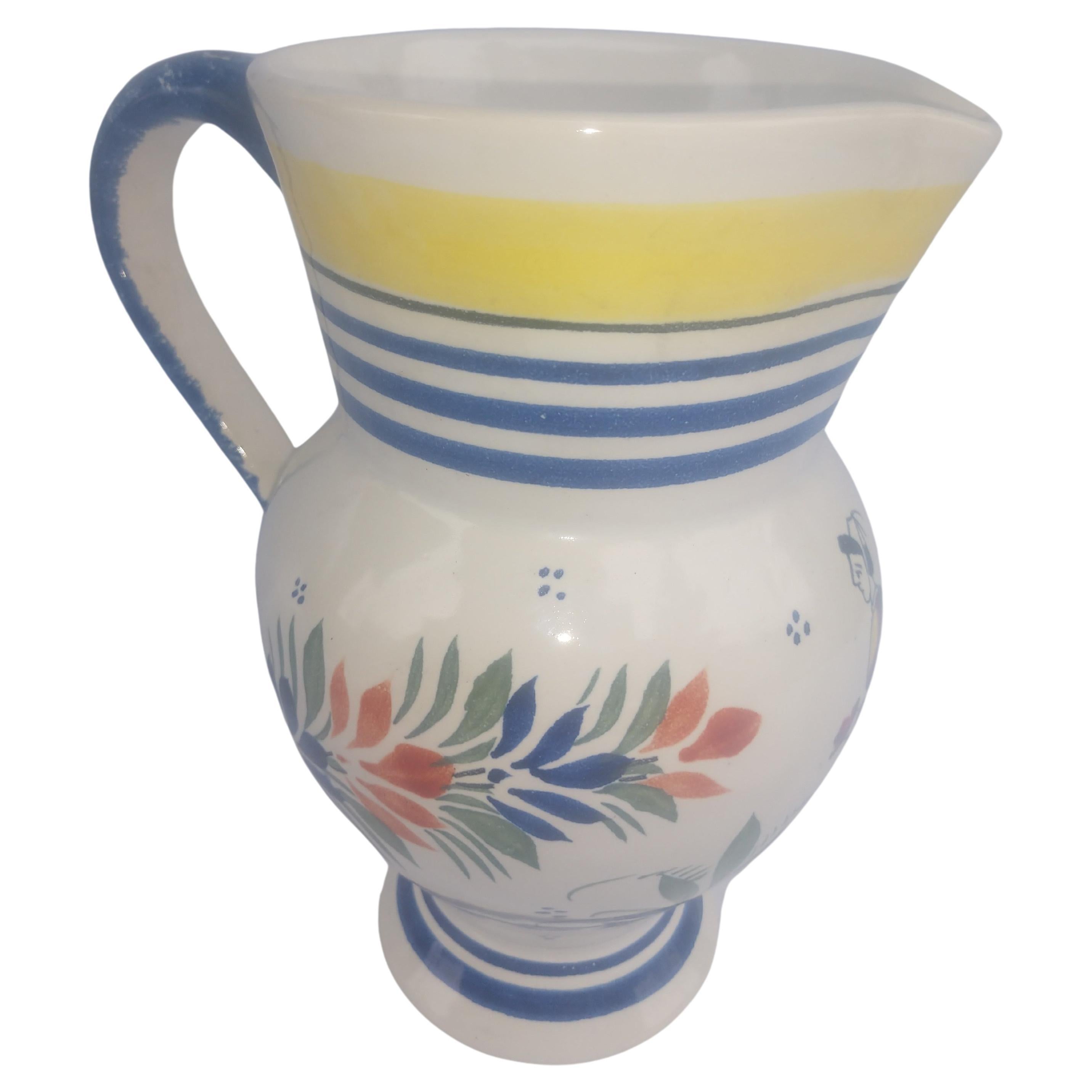 Fabulous hand thrown pitcher from the Henriot Quimper factory in France C1930. Hand decorated and without chips or cracks in excellent vintage condition. Eight inches tall with a generous handle. Beautifully executed shape. We have smaller sizes