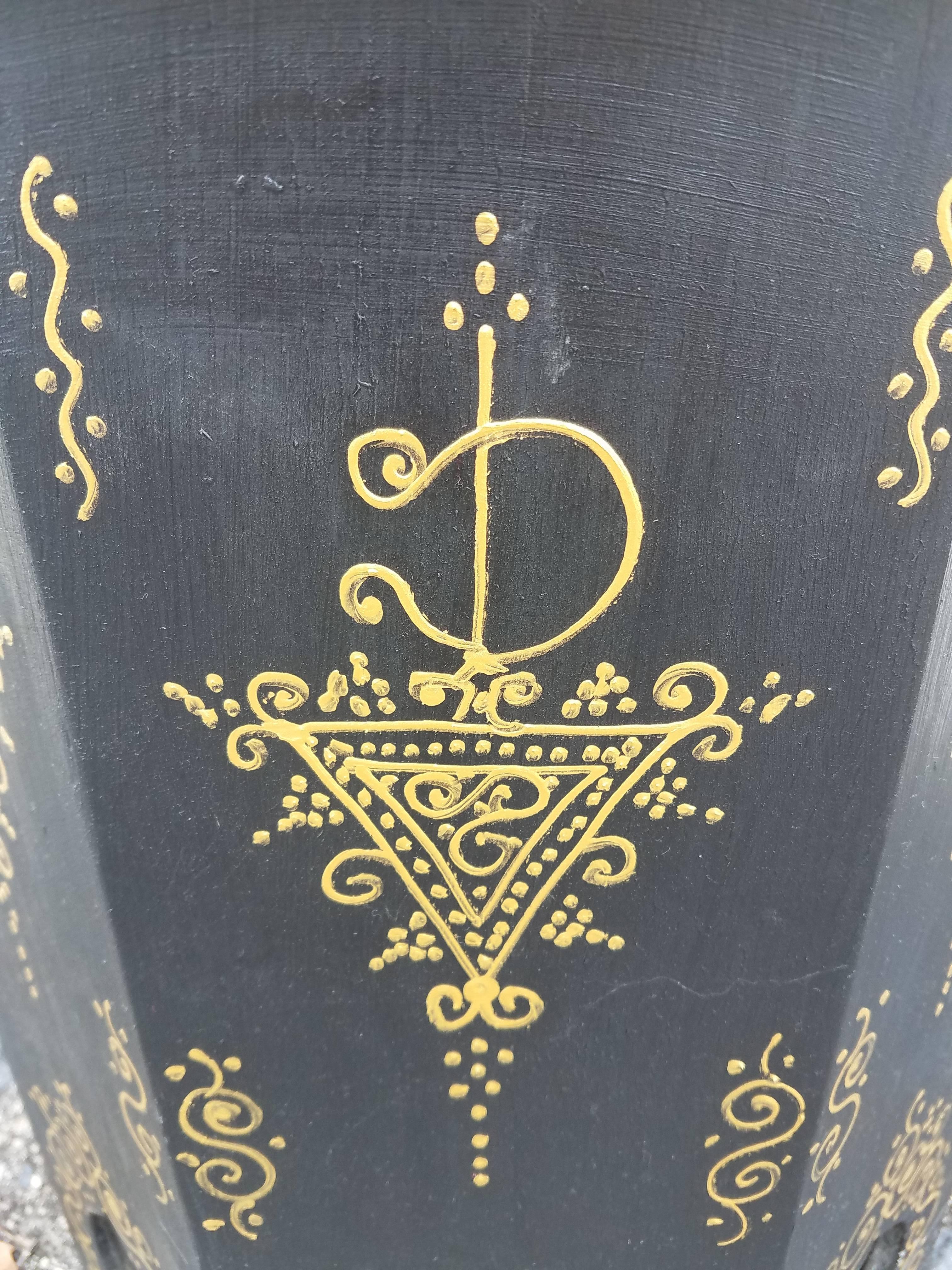 Rare find! 100% hand-painted Moroccan hexagonal shape side table. Black base with gold color design. Great handcraftsmanship throughout. Beautiful add-on to your decor. This table measures approximately 20