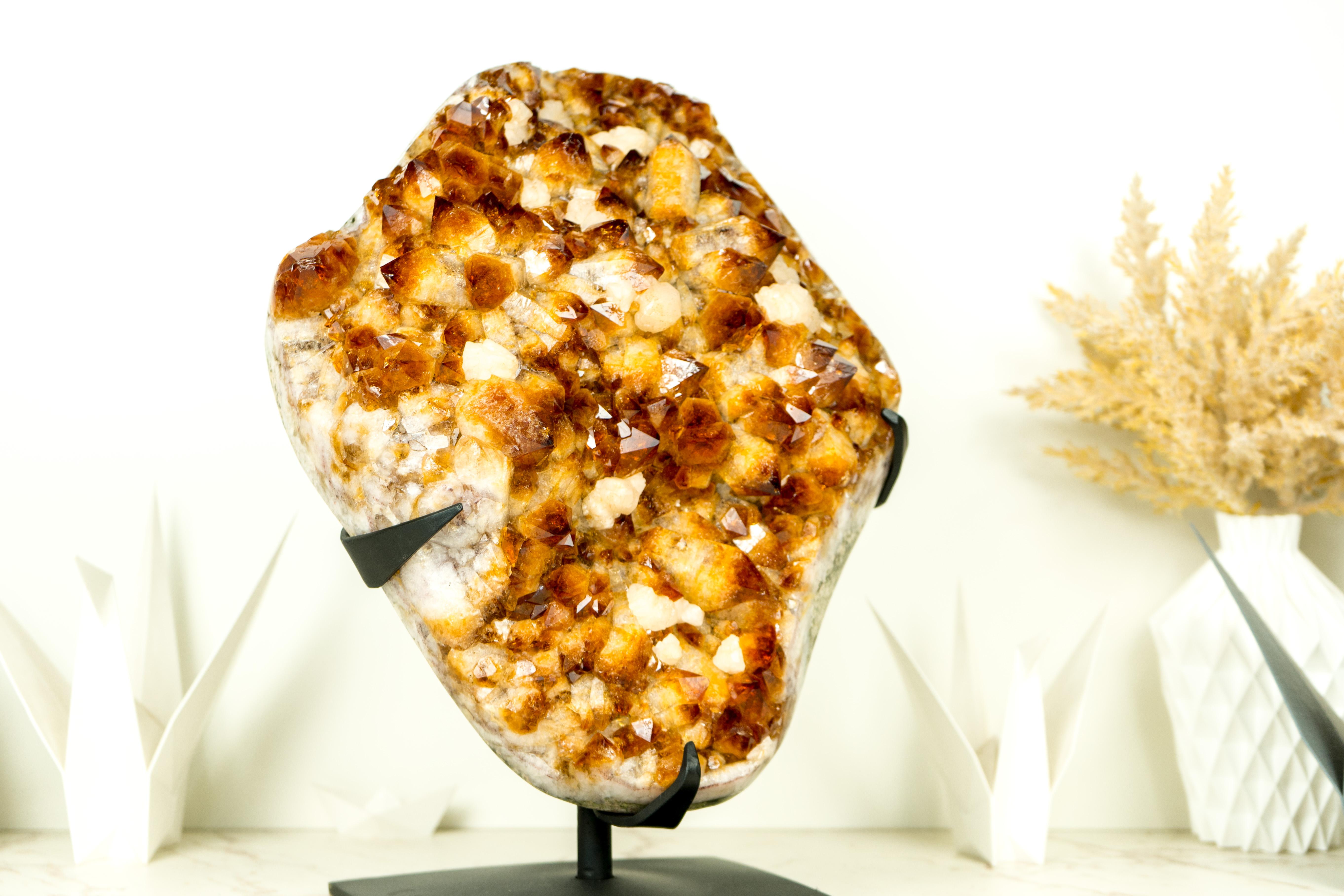 An extraordinary Citrine Cluster showcasing world-class characteristics such as Its deep, rich orange color tone and gorgeous aesthetics, making it a standout citrine for any collection, home decor, or energy healing. This remarkable Citrine