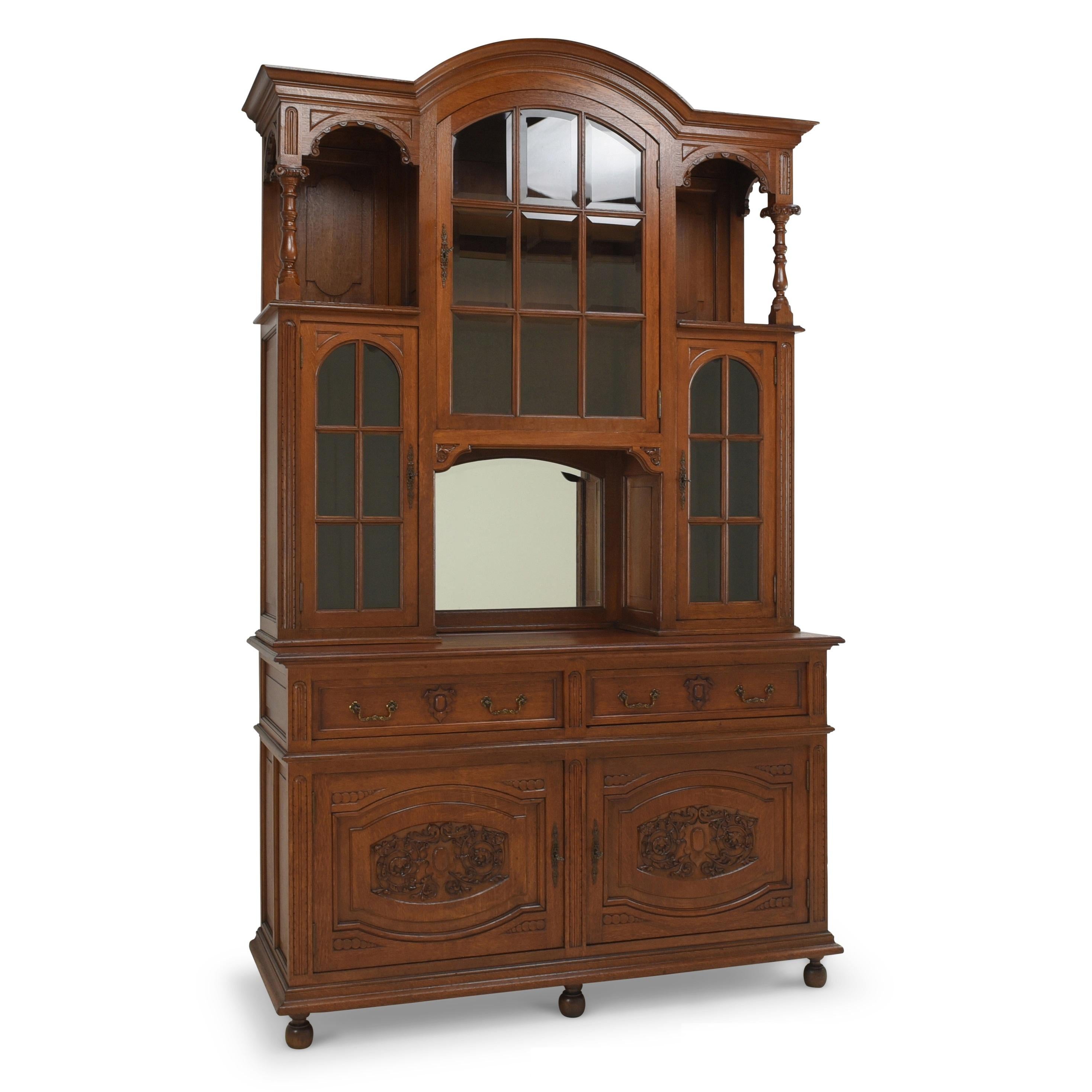 Large buffet restored Gründerzeit buffet cabinet solid oak high

Features:
High, Heavy quality
Drawers pronged
Beautiful carved decor
Original glazing with facet cut
Original fittings
Very high top with interesting division
Extraordinary