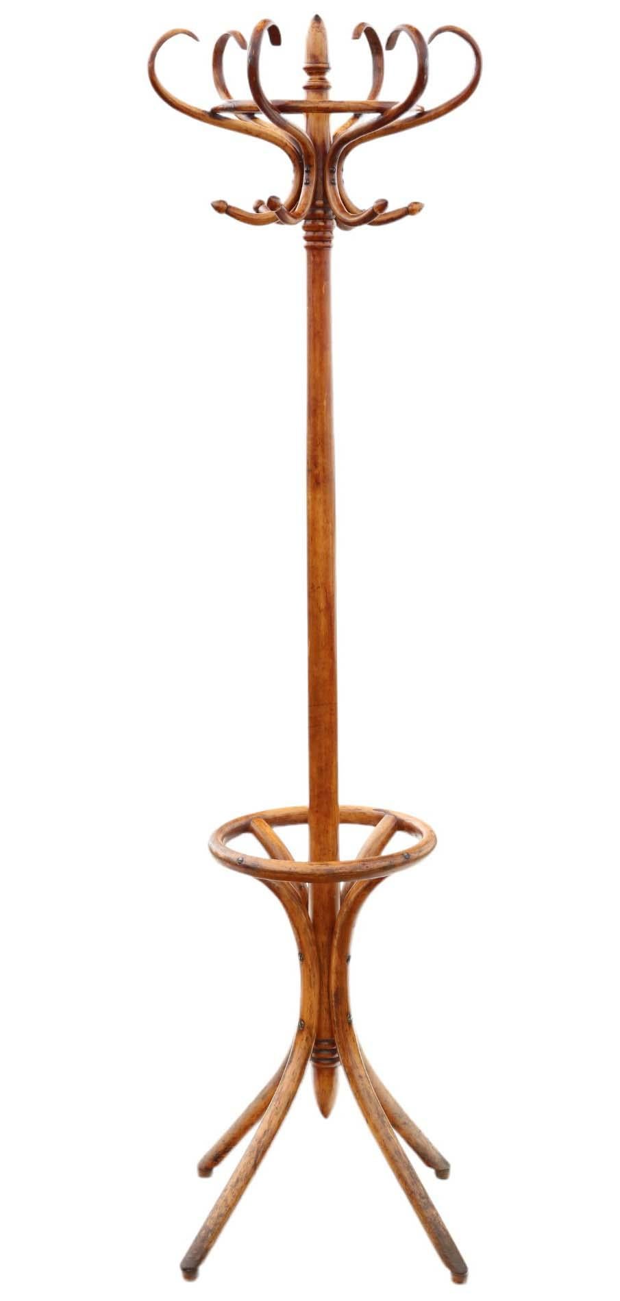 Antique circa 1900 large quality bentwood hall, coat, or hat stand.

Exceptional age, color, and patina make this a rare decorative find,, with a rotating removable top.

This piece exhibits no loose joints or woodworm.

Maximum dimensions:

Top