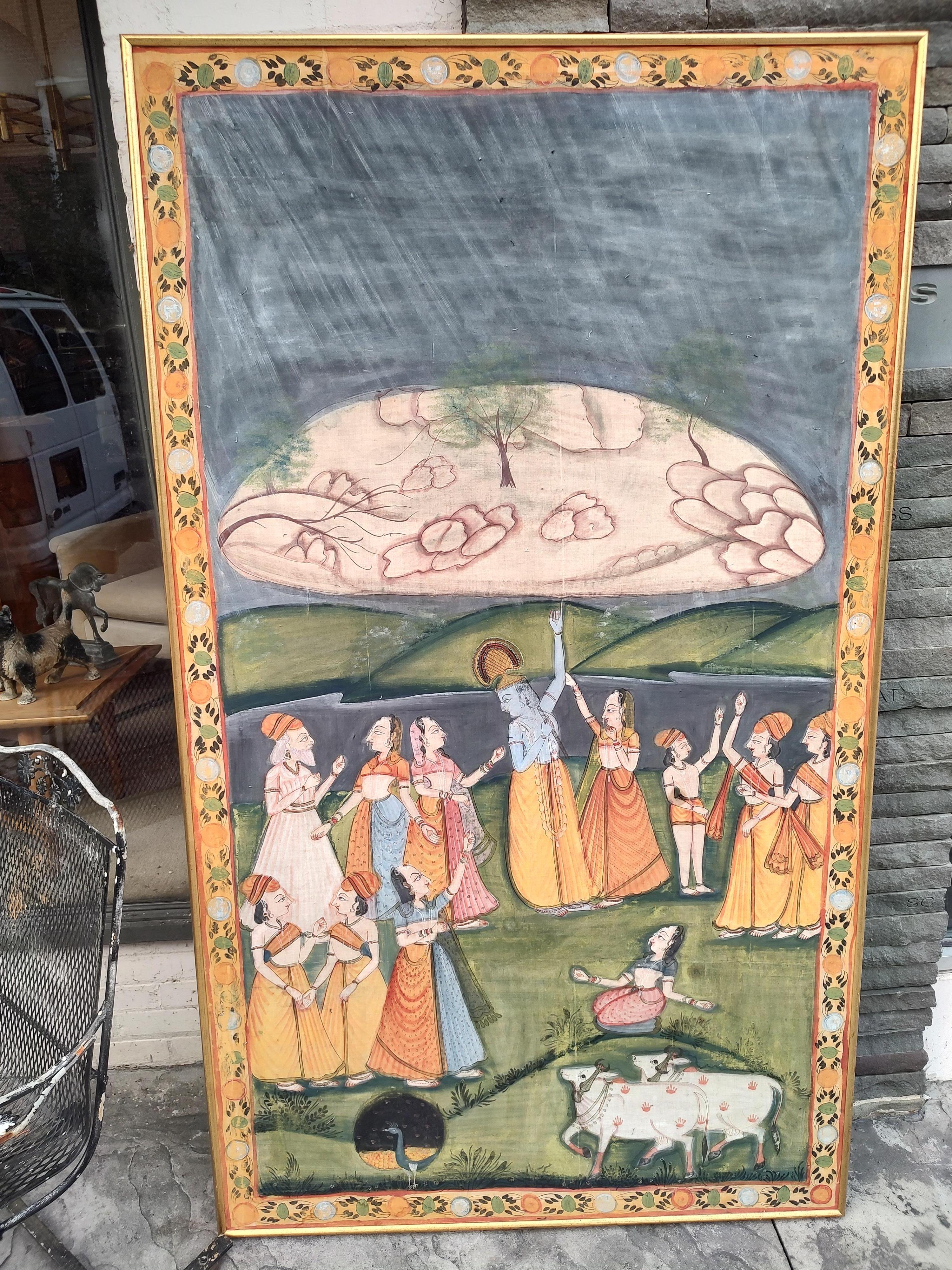 Grande peinture murale hindoue sur tissu de soie. Dimensions : 44,5 x 76 x 1,5 cm : 44,5 x 76 x 1,5. Encadré dans un cadre en bois doré.