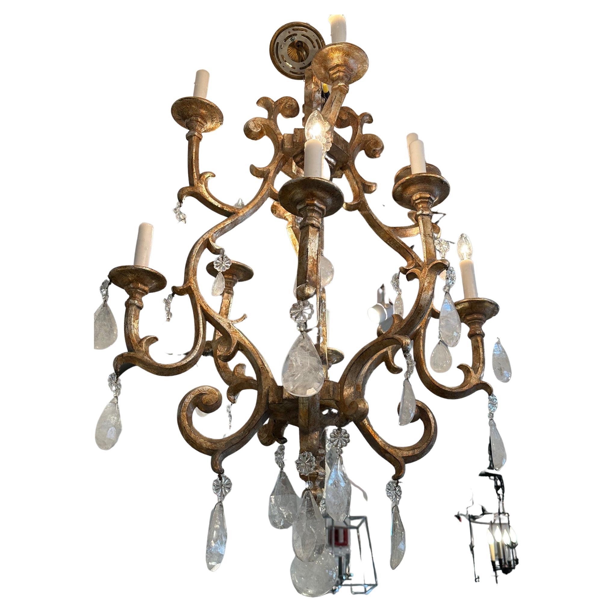 Fabulously stylish contemporary designer giltwood multi arm chandelier with big glamorous rock crystals.
Note: Pair of matching sconces are available.

