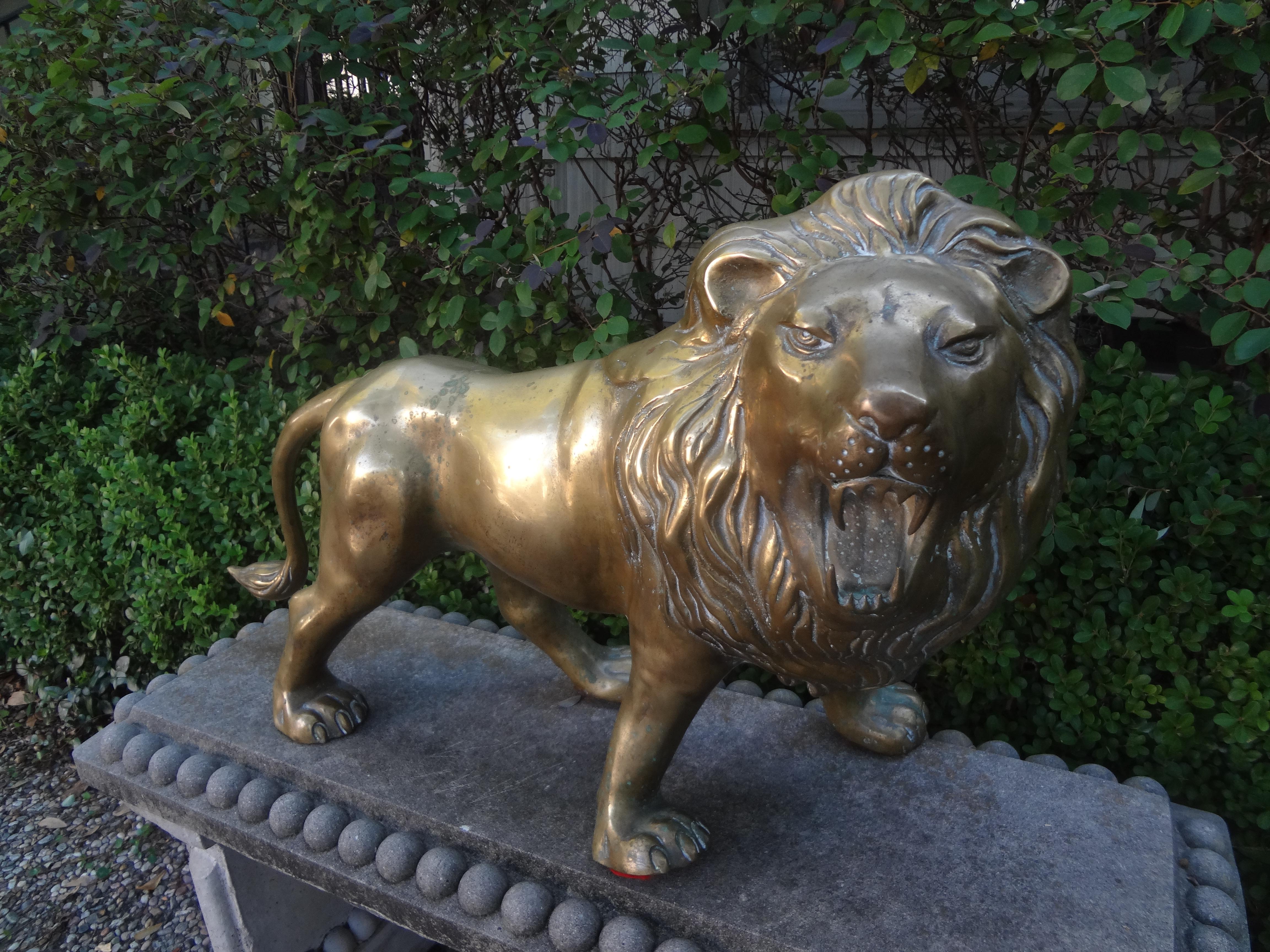 Large Hollywood Regency Brass Lion Sculpture.
We offer a friendly Hollywood Regency brass lion statue or sculpture. Beautifully detailed and ready to add a touch of whimsy to your interior.
