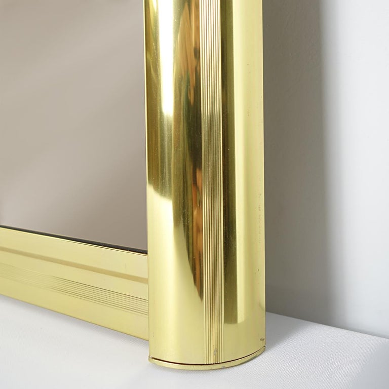Large Hollywood Regency Brass Wall Mirror with Rounded Edges For Sale at 1stDibs