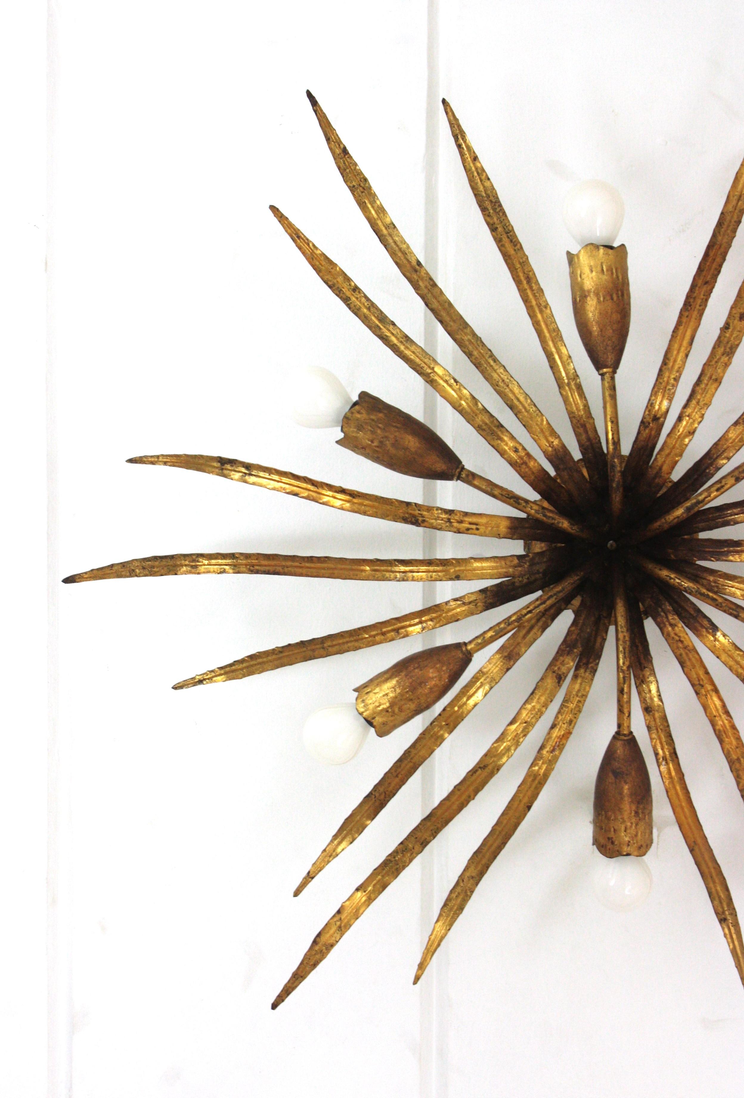 Metal Large Hollywood Regency Foliage Ceiling Light Fixture in Gilt Iron, Spain 1940s For Sale