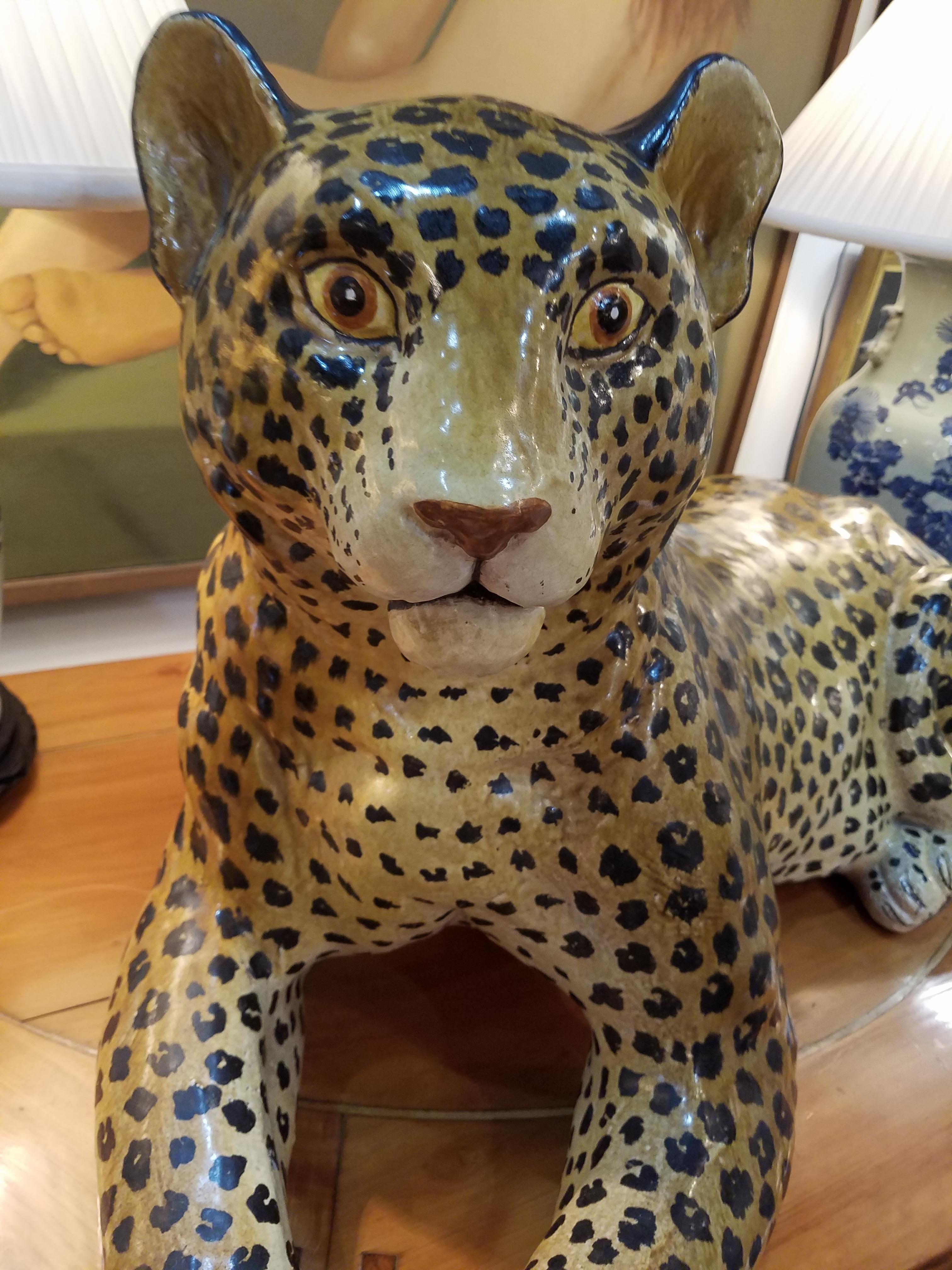 Wonderful midcentury Italian reclining cheetah or leopard. Large size statement piece. Signed Italy underneath.

Measures: 37