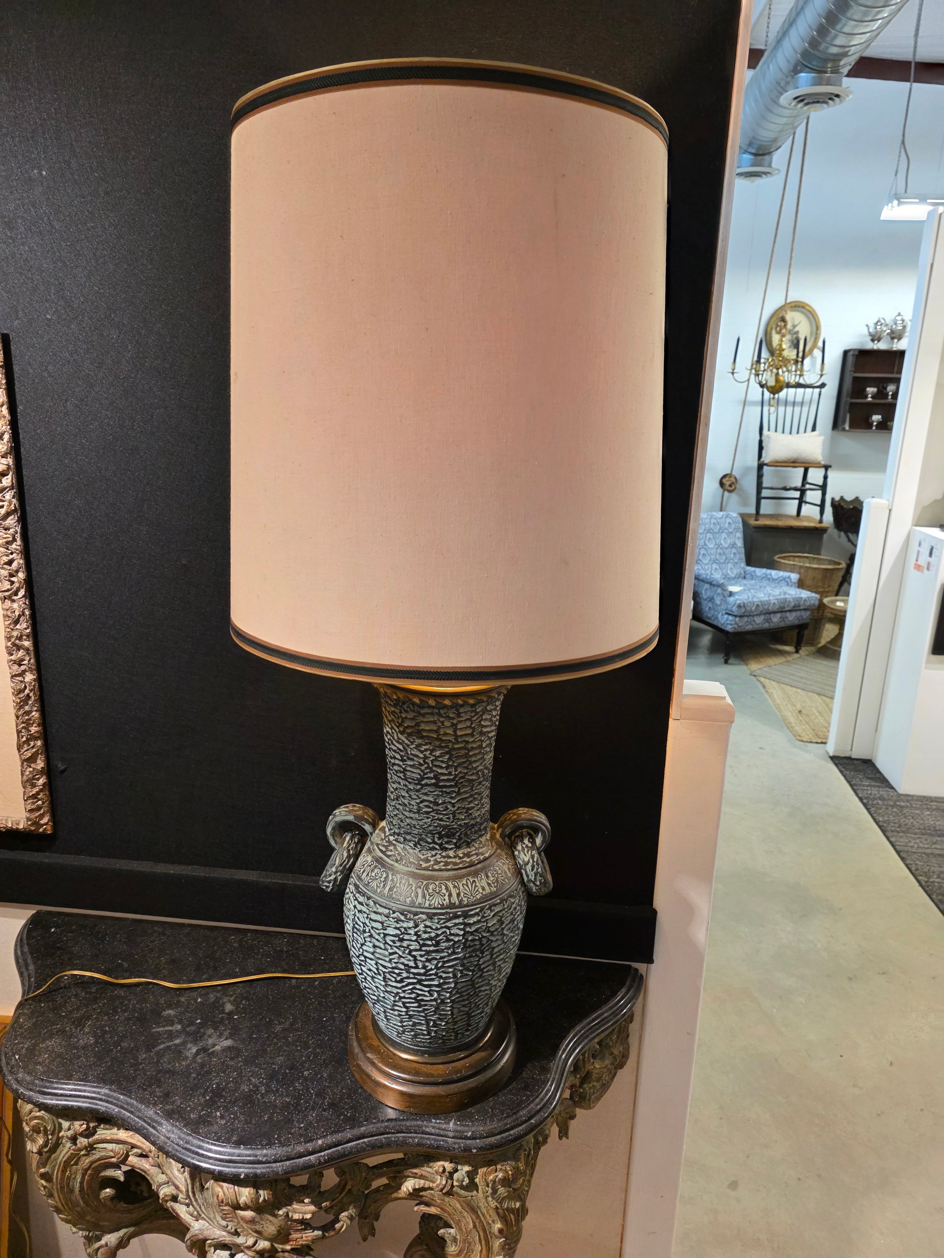Hey beautiful and unusual lamp by the Marlboro lamp company. Created the 1950s this substantial piece has survived over 60 years. The body is made of cast and sculpted terracotta and then hand painted to look like bronze. This lamp also retains the