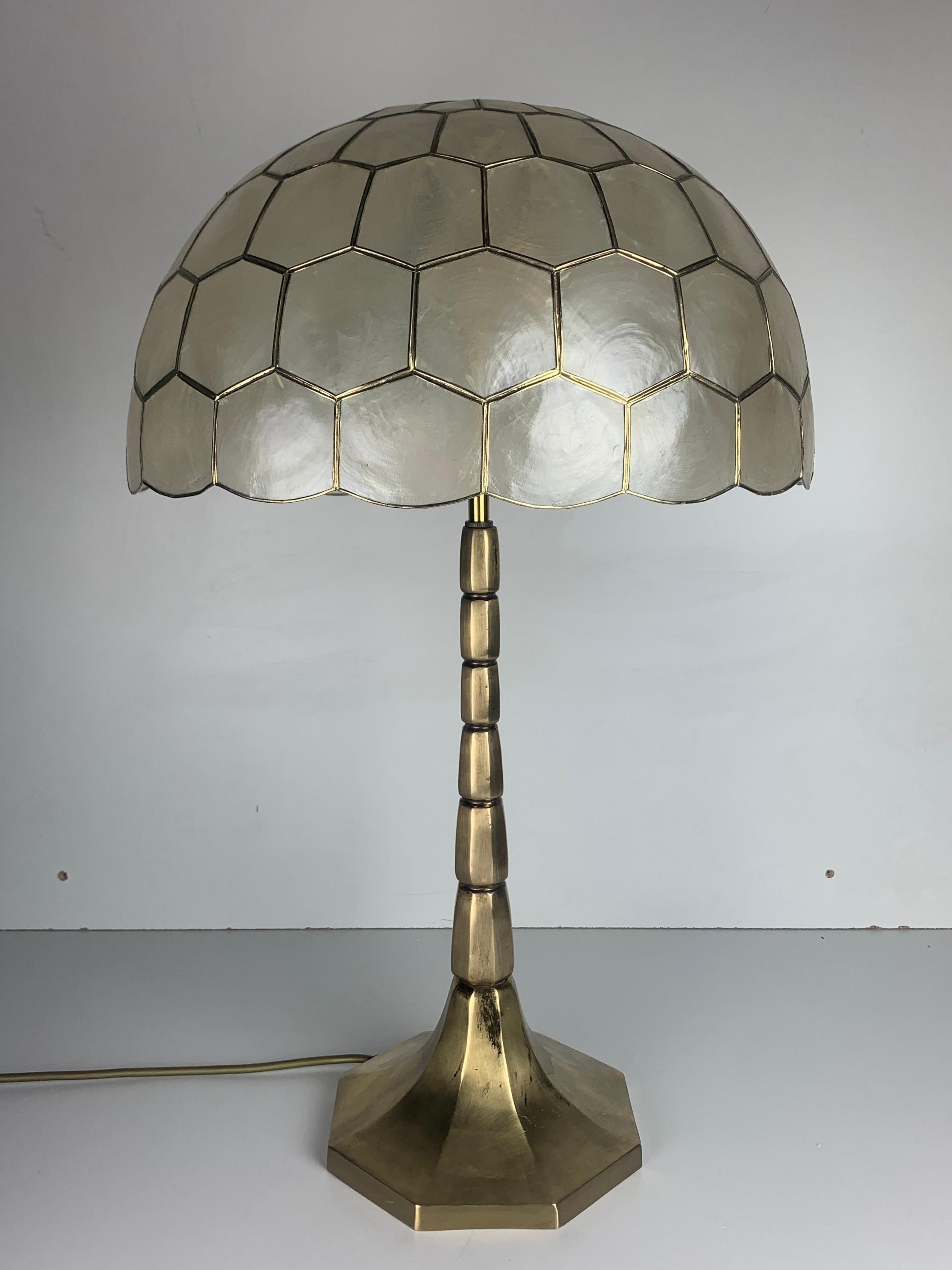 Stunning midcentury Capiz table lamp attributed to Germany 1960s. The Cadiz shell most commonly found in the Philippines was popular amongst various makers such as the Feldman Lighting Co from Los Angeles and various German manufacturers like Rausch